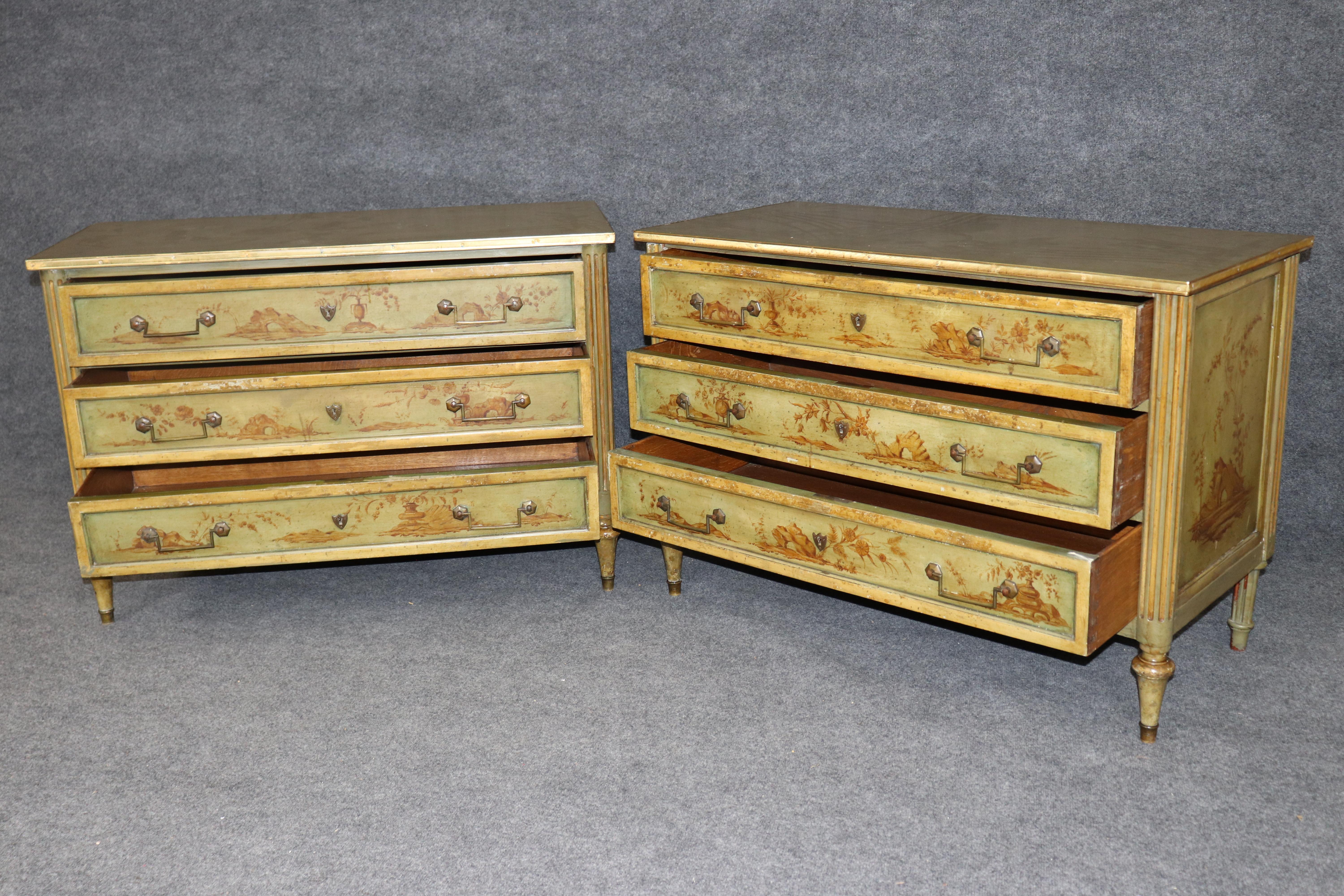 This is a wonderful pair of distressed finished pale apple green, French made Directoire commodes attributed to Maison Jansen. The commodes are a rare pair of three drawer commodes and have beautiful Chinoiserie painted scenery and are in The piece