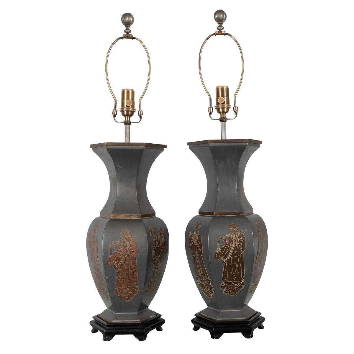 Pair of enameled metal chinoiserie motif table lamps with painted wood bases in the style of James Mont.