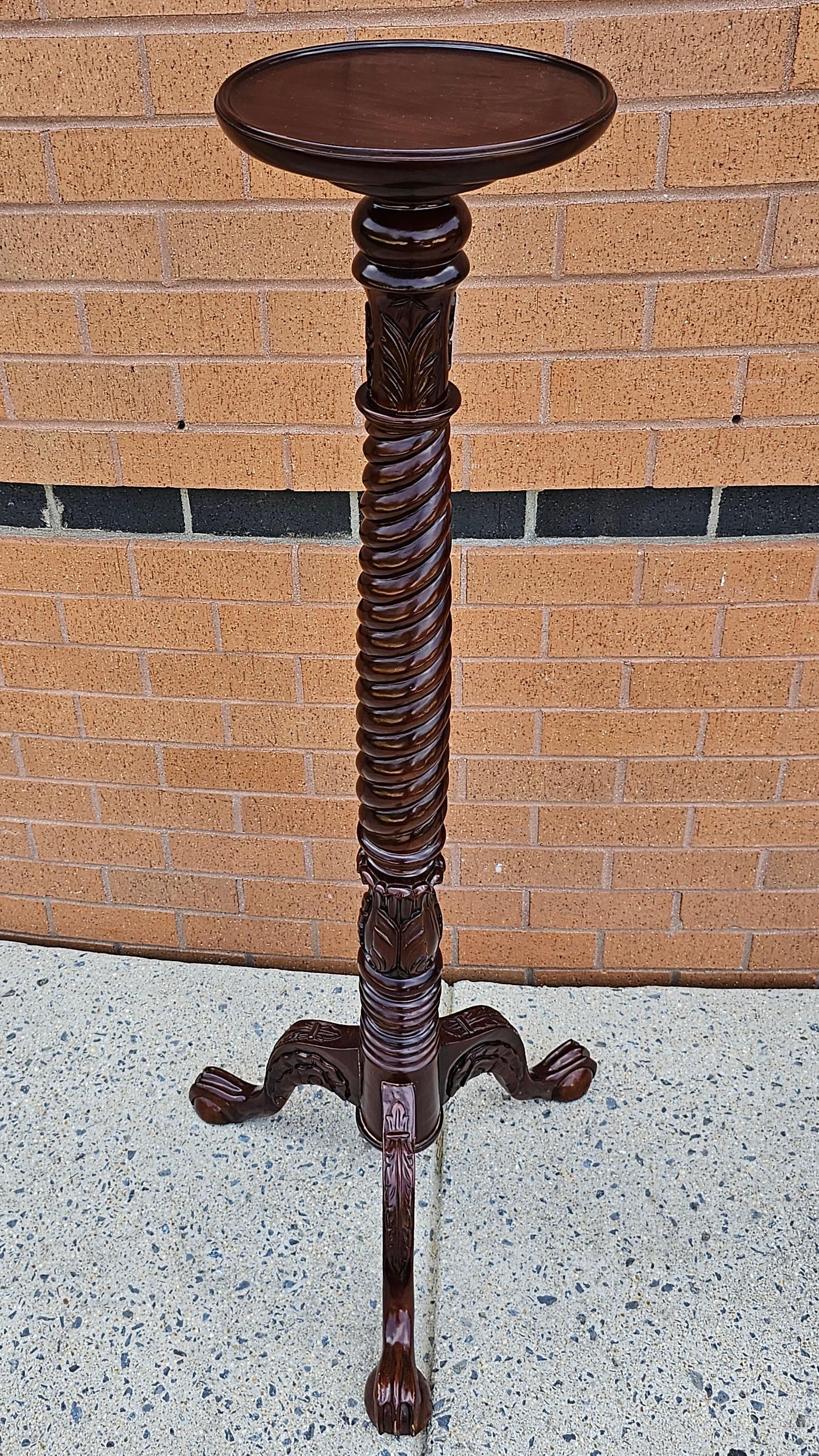 Pair of Chippendale Style Carved and Stained Mahogany Stands with Ball Claw Feet In Excellent Condition For Sale In Germantown, MD