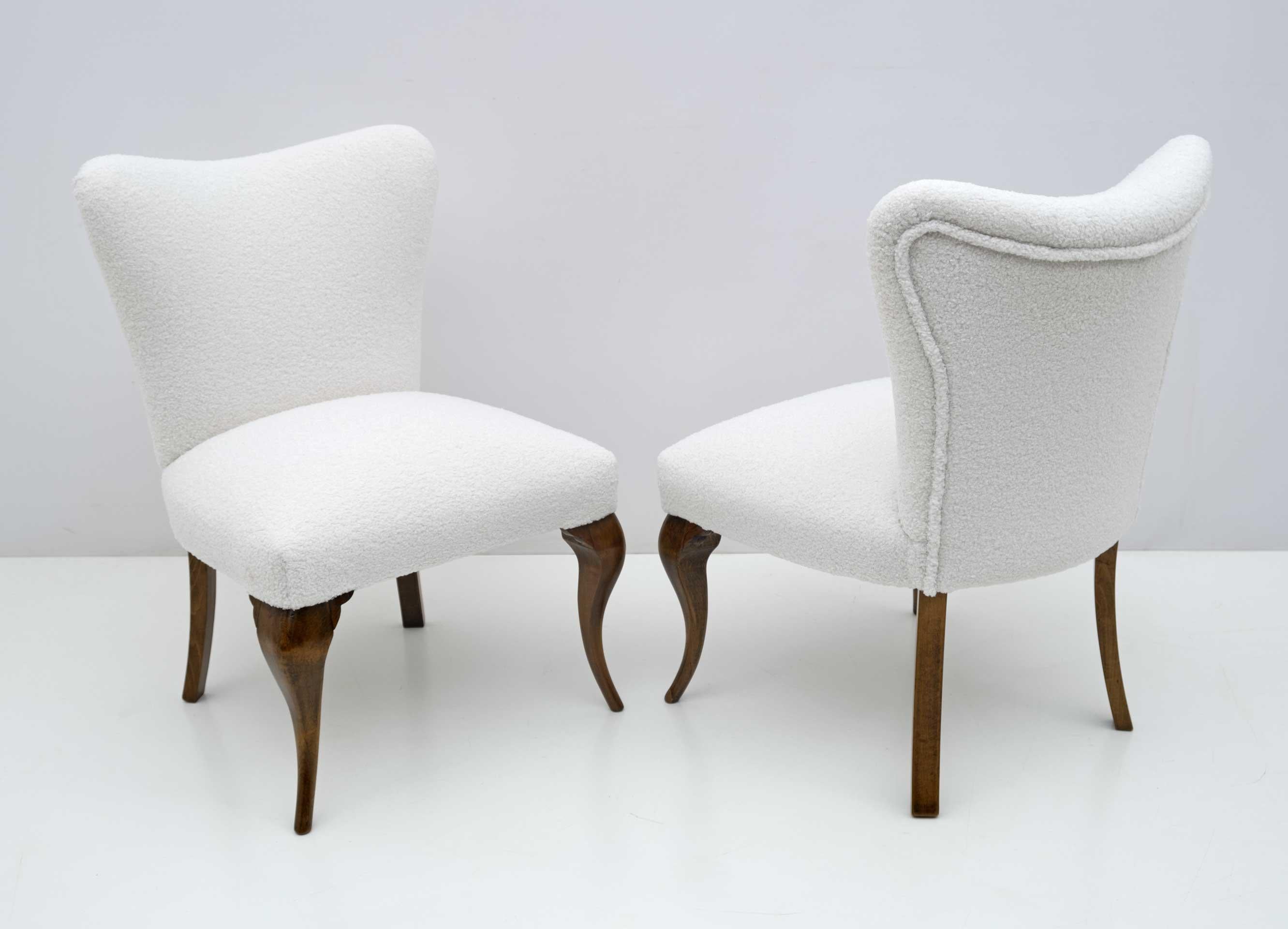 Pair of Chippendale style armchairs, Italian production in the 1940s, completely restored and upholstered in Boucle fabric. They fit very well in a bedroom or living room.