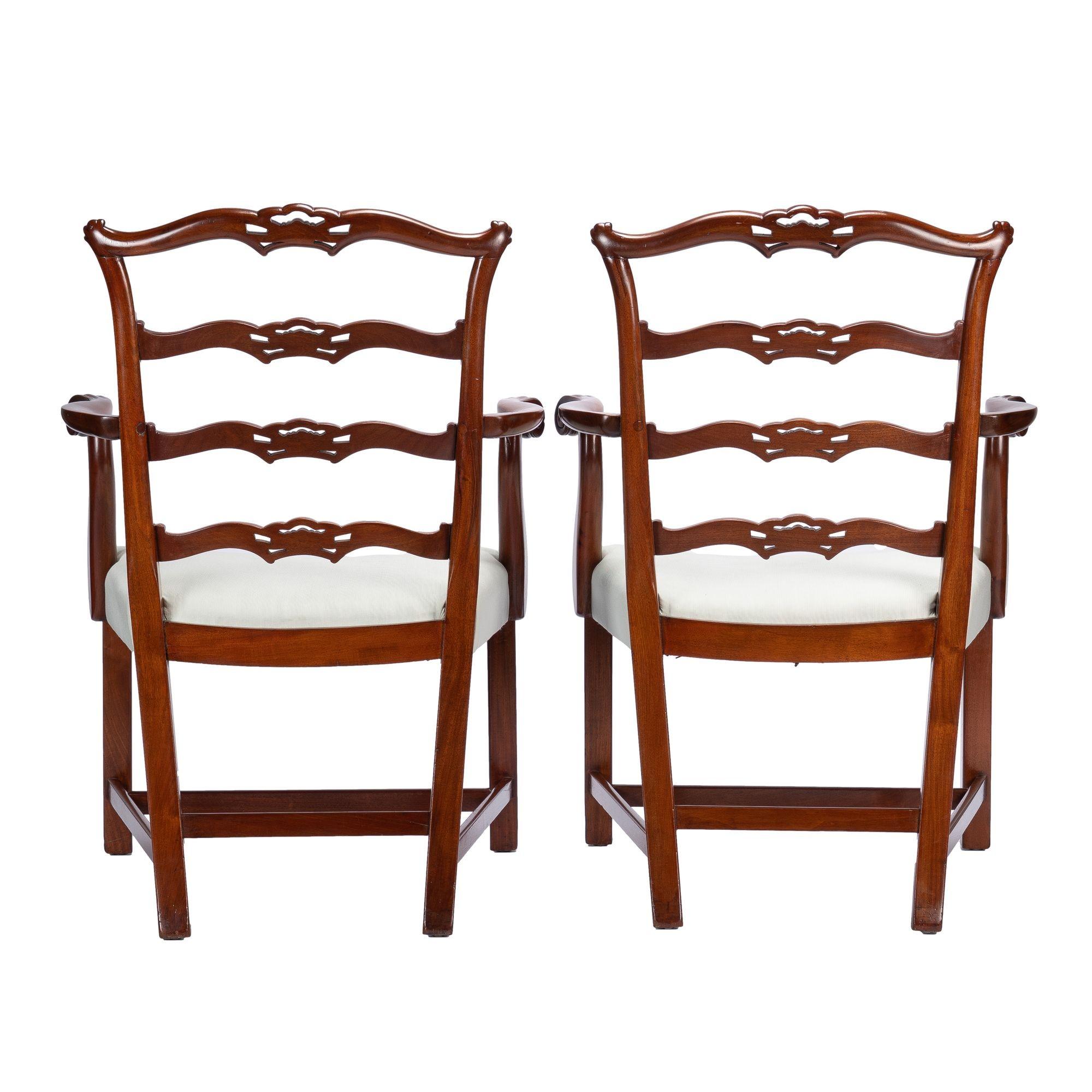 20th Century Pair of Chippendale style ladder back arm chairs, c. 1930-40 For Sale