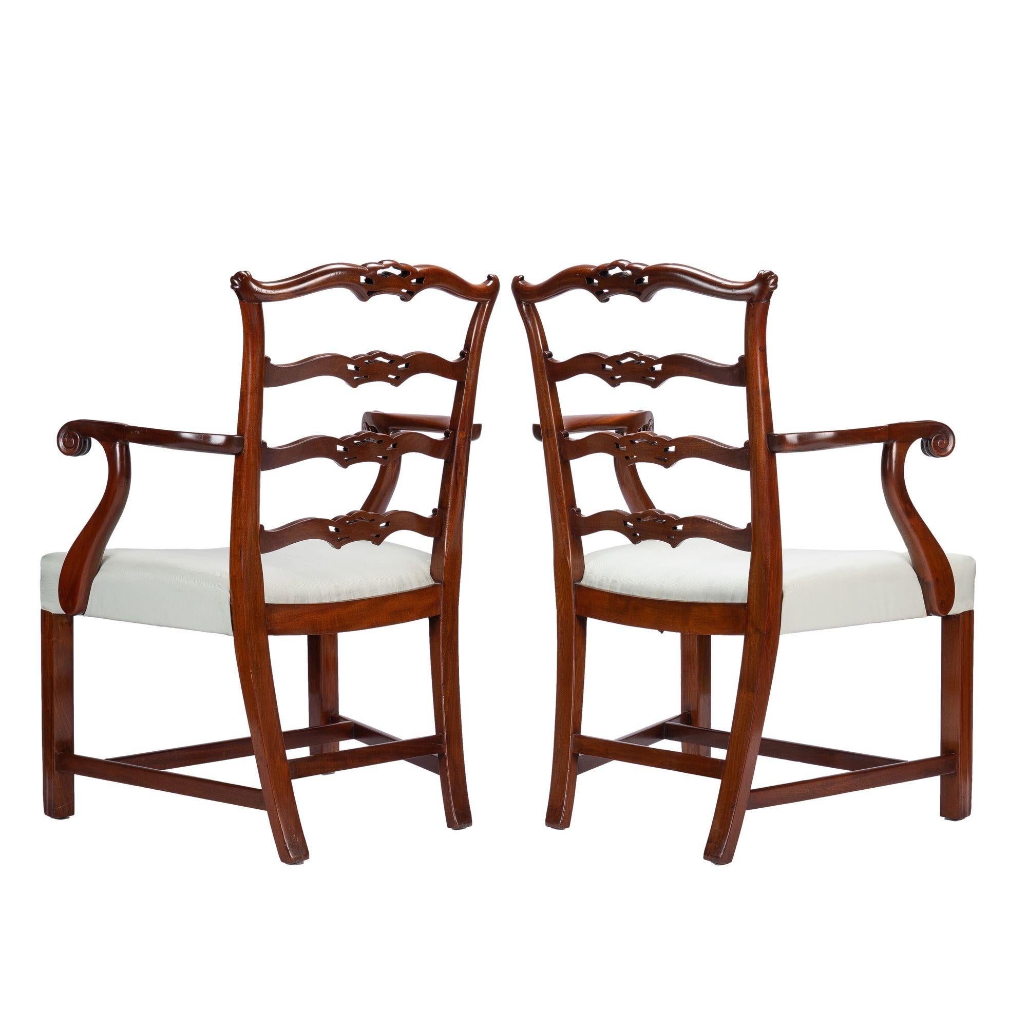 Upholstery Pair of Chippendale style ladder back arm chairs, c. 1930-40 For Sale