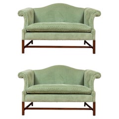 Pair of Chippendale Style Mahogany Framed Camelback Loveseats