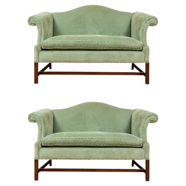 Pair of Chippendale Style Mahogany Framed Camelback Loveseats For Sale