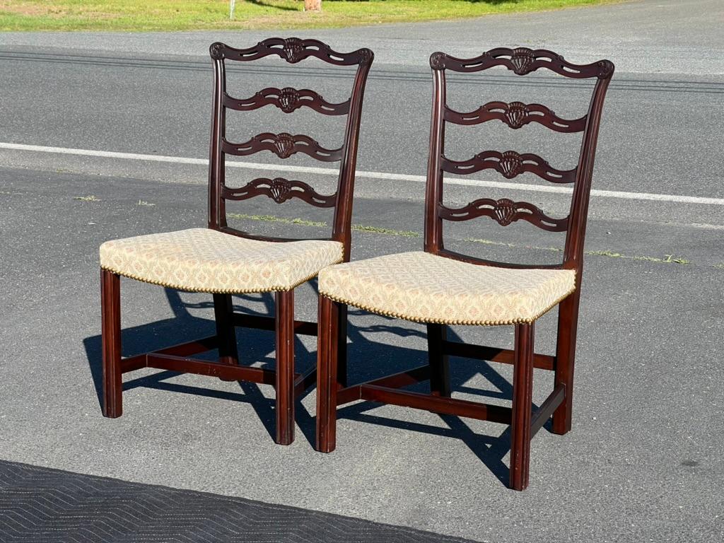 Introducing a stunning pair of Chippendale Style Ribbon Back Chairs, beautifully crafted to embody the timeless elegance and sophisticated design of the Chippendale era. These chairs are perfect examples of classic craftsmanship and artistic