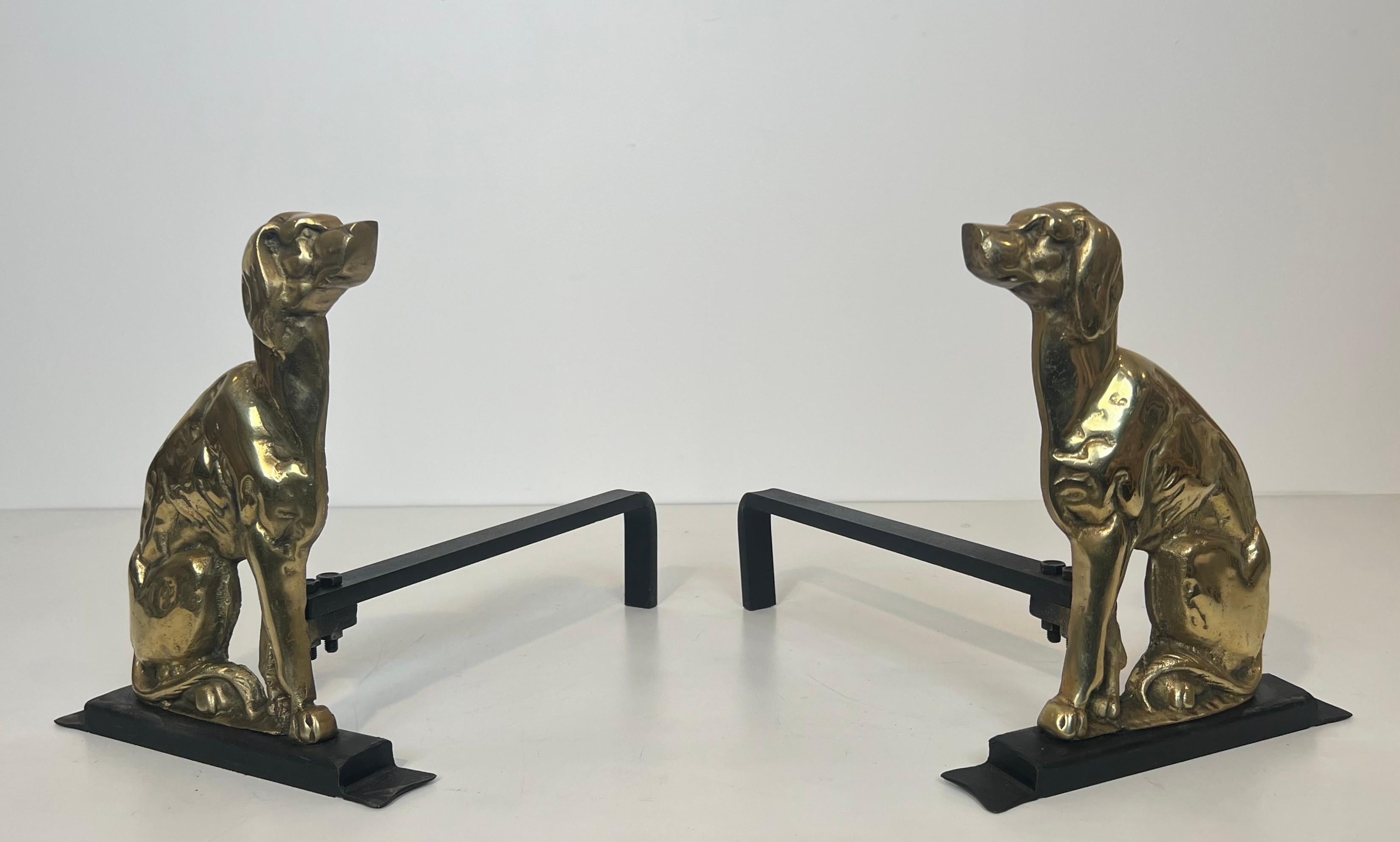 This very nice pair of andirons is made of chiseled bronze. They represents stylished dogs standing. Thisi is a French work from Art Deco period. Circa 1930.