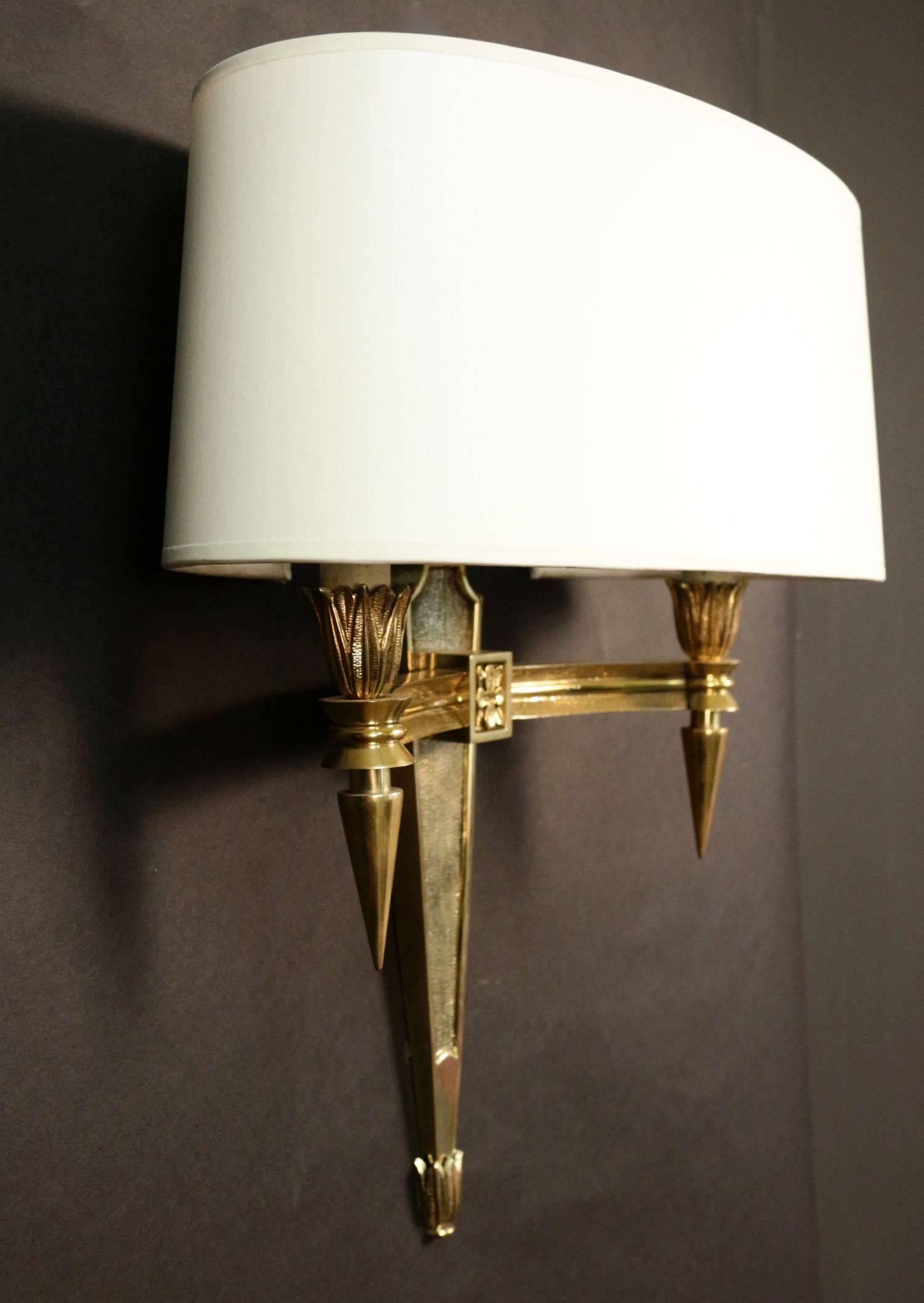 Mid-Century Modern Pair of Chiseled Bronze Sconces For Sale