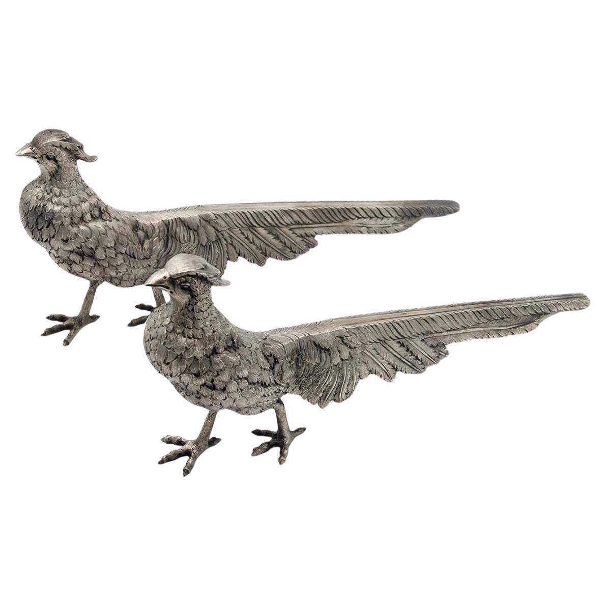 Pair of chiseled silver pheasants