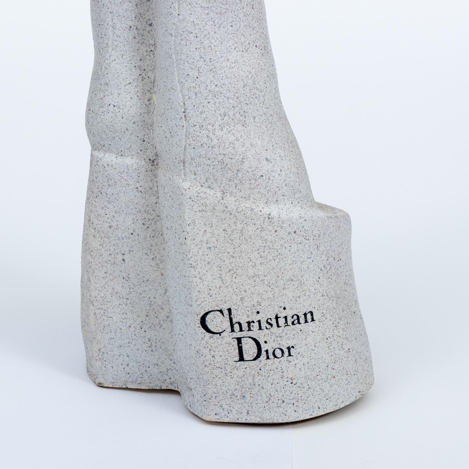 Pair of Christian Dior La Femme store display busts composed of speckled hard foam resin, circa 1980s. The Christian Dior logo is featured on the base. Made in France. Please note of wear consistent with age.