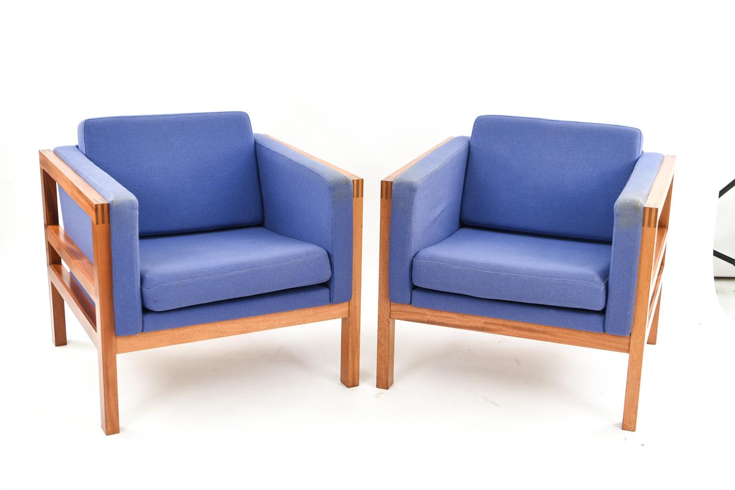 A beautiful pair of Danish midcentury lounge chairs by Christian Hvidt. With mahogany frames.