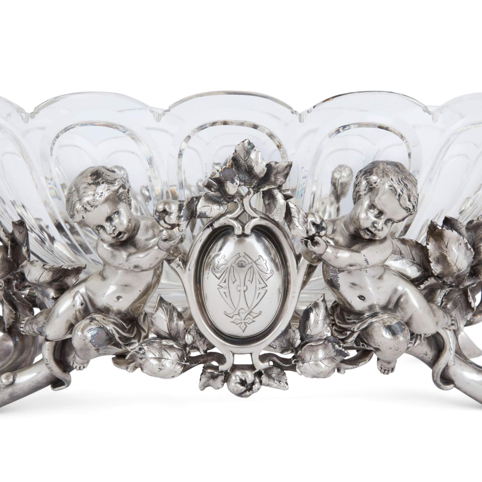 Pair of Christofle cut-glass and silvered bronze centrepieces
French, 19th Century
Height 24cm, width 63cm, depth 35cm

This exquisite pair were made by the French manufactory Christofle. Founded in 1830 by Charles Christofle, the firm was the first