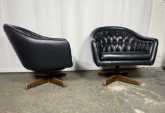 Pair of Chromcraft Black Tufted Swivel Lounge Chairs.. Ward Bennett