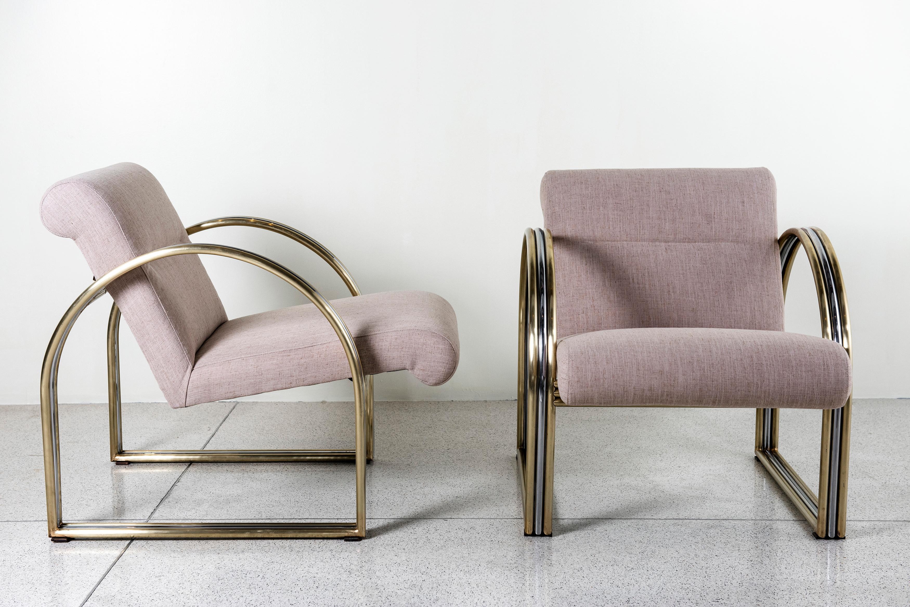 Pair of chrome and bronze armchairs.