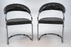 Pair of chrome and faux leather chairs by Giotto Stoppino. Italy 1970s