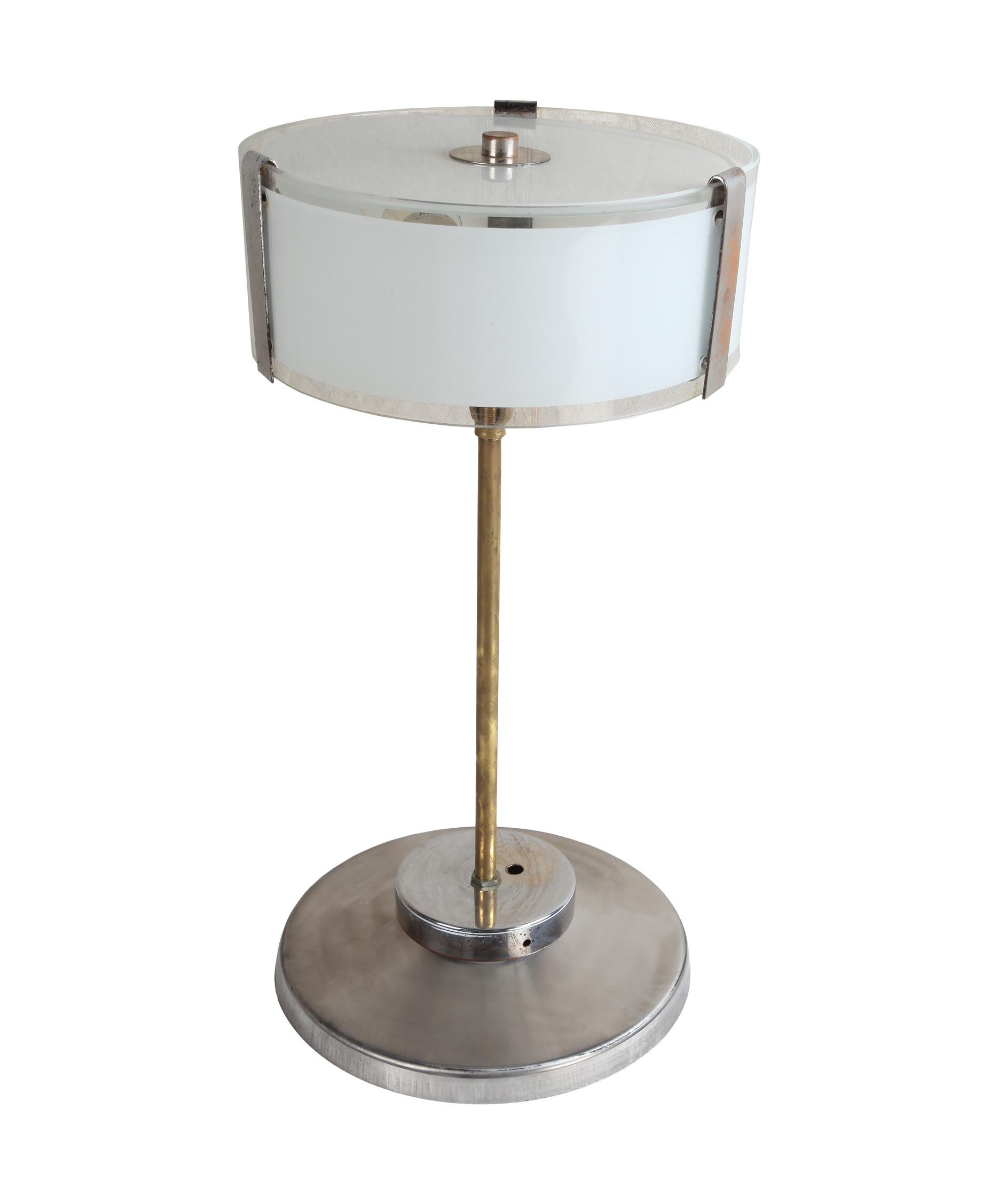 Pair of chrome Mid-Century Modern table lamps with frosted glass shade. Brass stem. Each lamp has two standard size light sockets and rewired for American use. European. These could actually look great as pendants, see the last photo. Just the shade