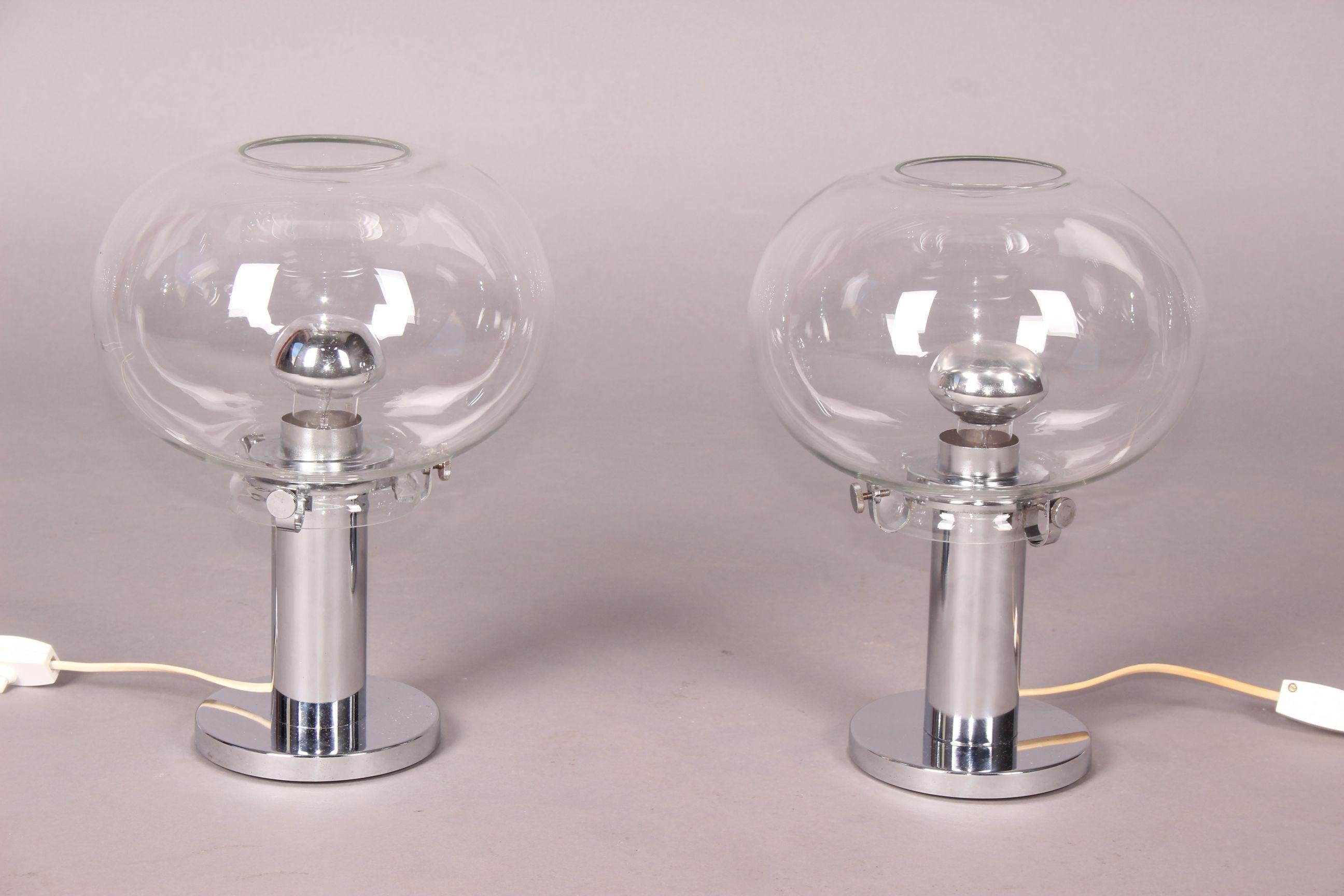 Pair of chrome and glass table lamp.