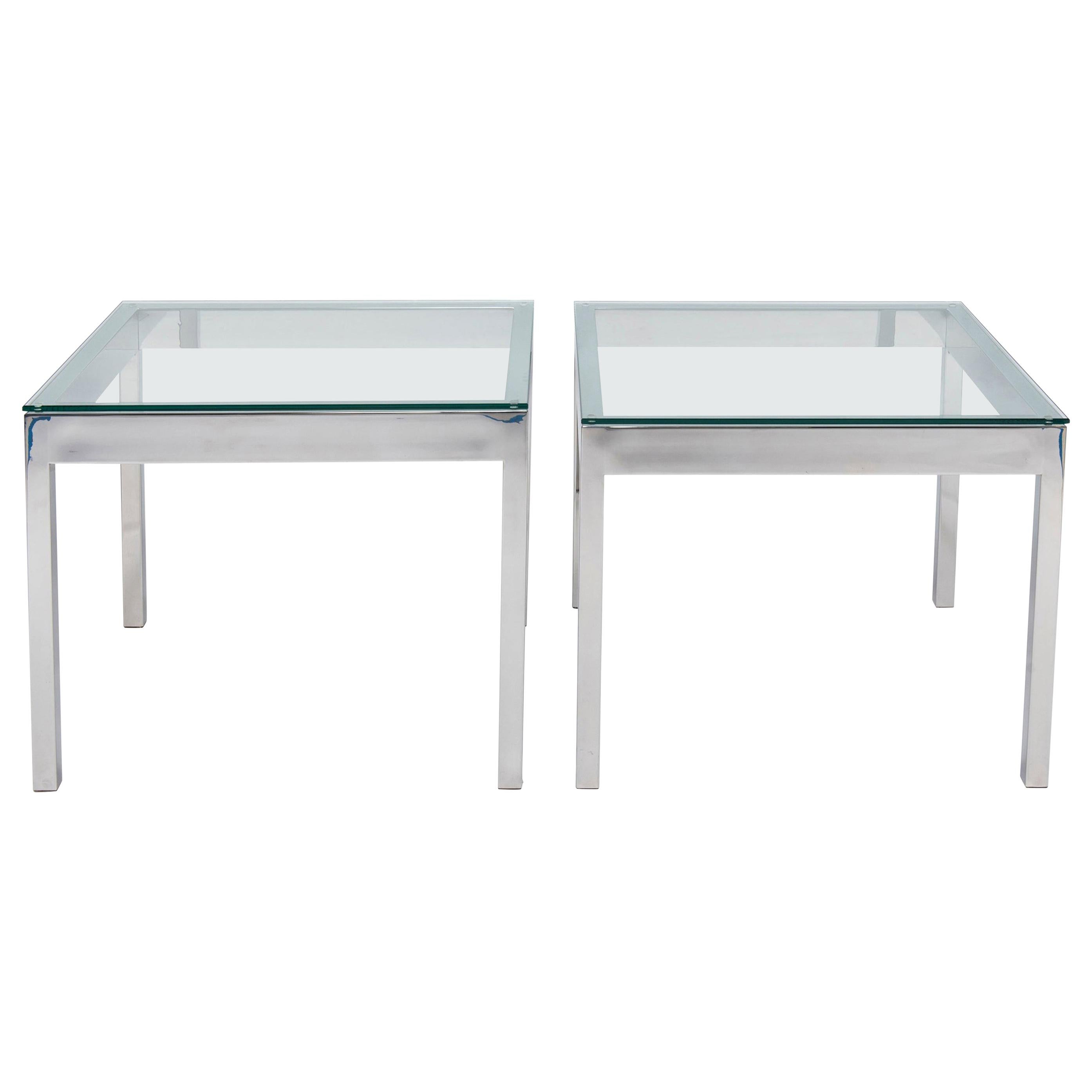 A 1970s near pair of chrome and glass end tables. The tables are close in dimension with new glass tops.
Dimensions:
Table I) 24.5 inches H x 30 inches W x 30 inches D
Table II) 24.5 inches H x 30 inches W x 26 inches D.