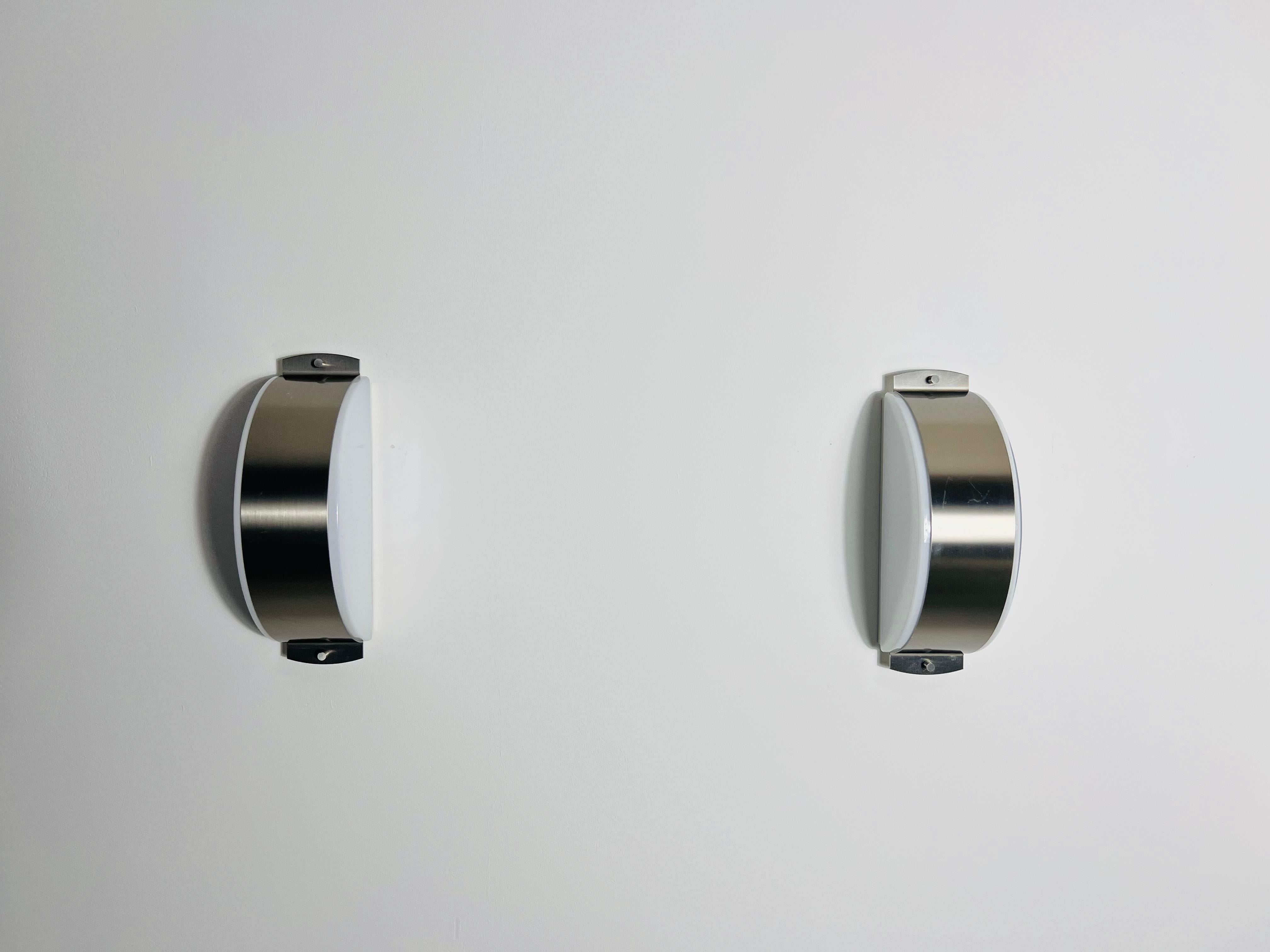 Mid-Century Modern Pair of Chrome and Opaline Glass Wall Lamps by Glashütte Limburg, 1960s For Sale