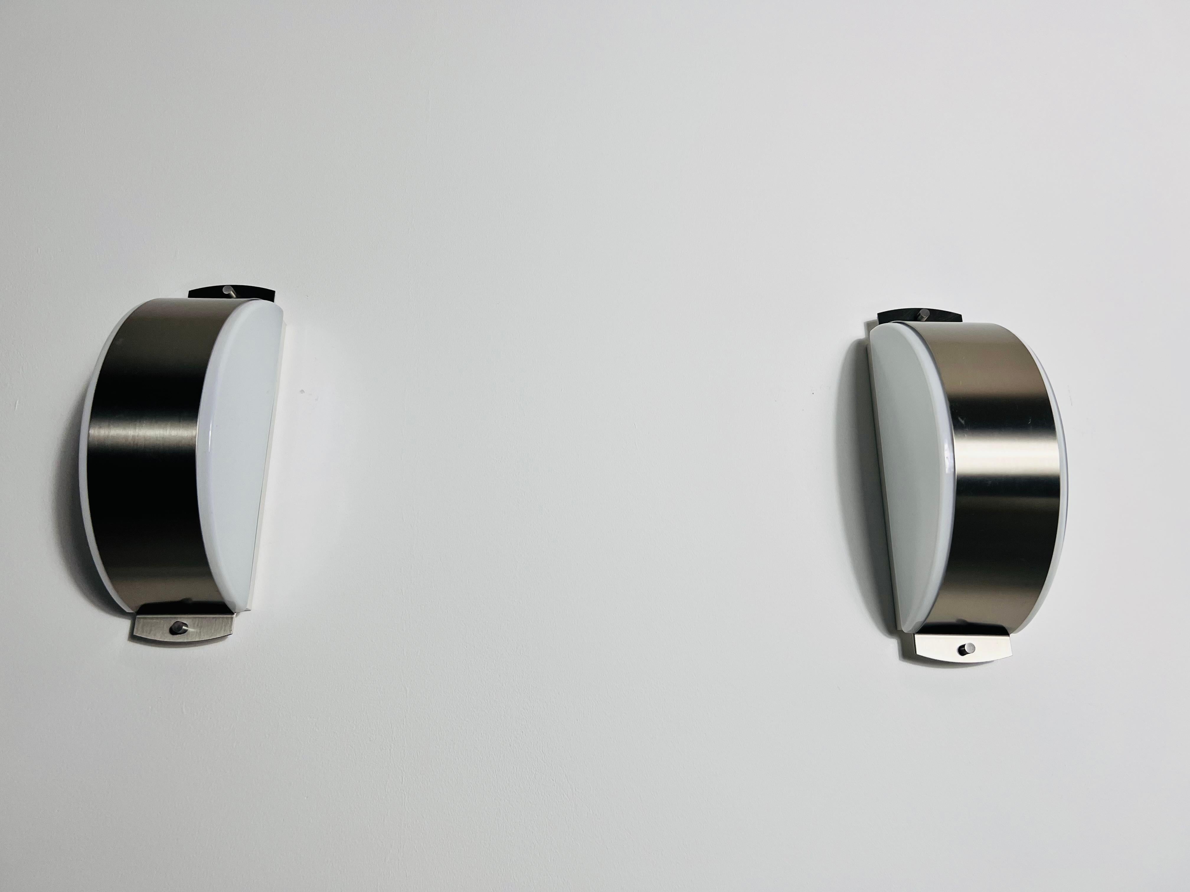 Mid-20th Century Pair of Chrome and Opaline Glass Wall Lamps by Glashütte Limburg, 1960s For Sale