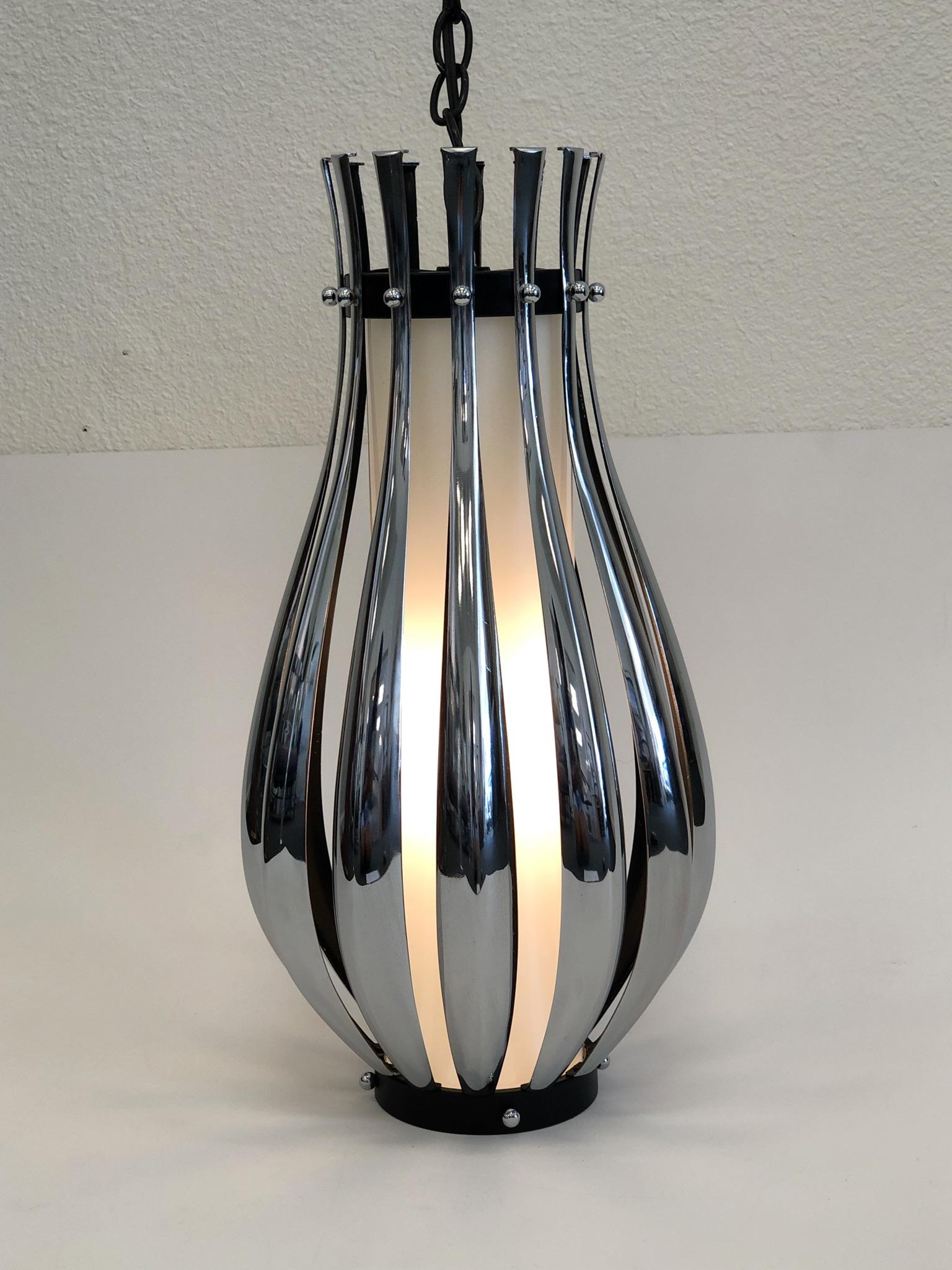 Late 20th Century Pair of Chrome and White Glass Pendant Lamps by Sonneman For Sale