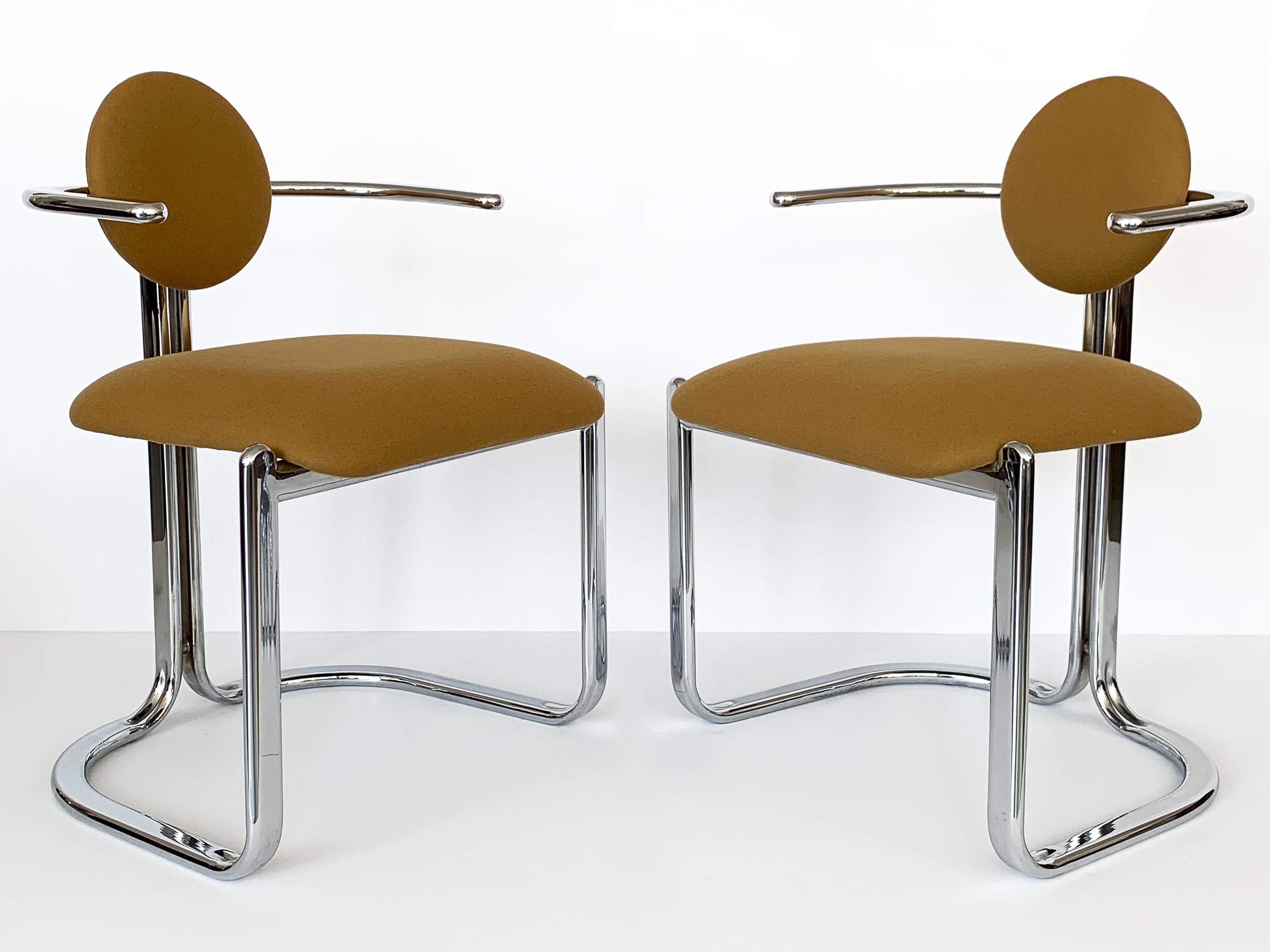 Pair of chrome modernist armchairs by Gastone Rinadli for Thema Italy, circa 1970s. Newly upholstered in a camel colored wool felt fabric. Postmodern in style with a 10
