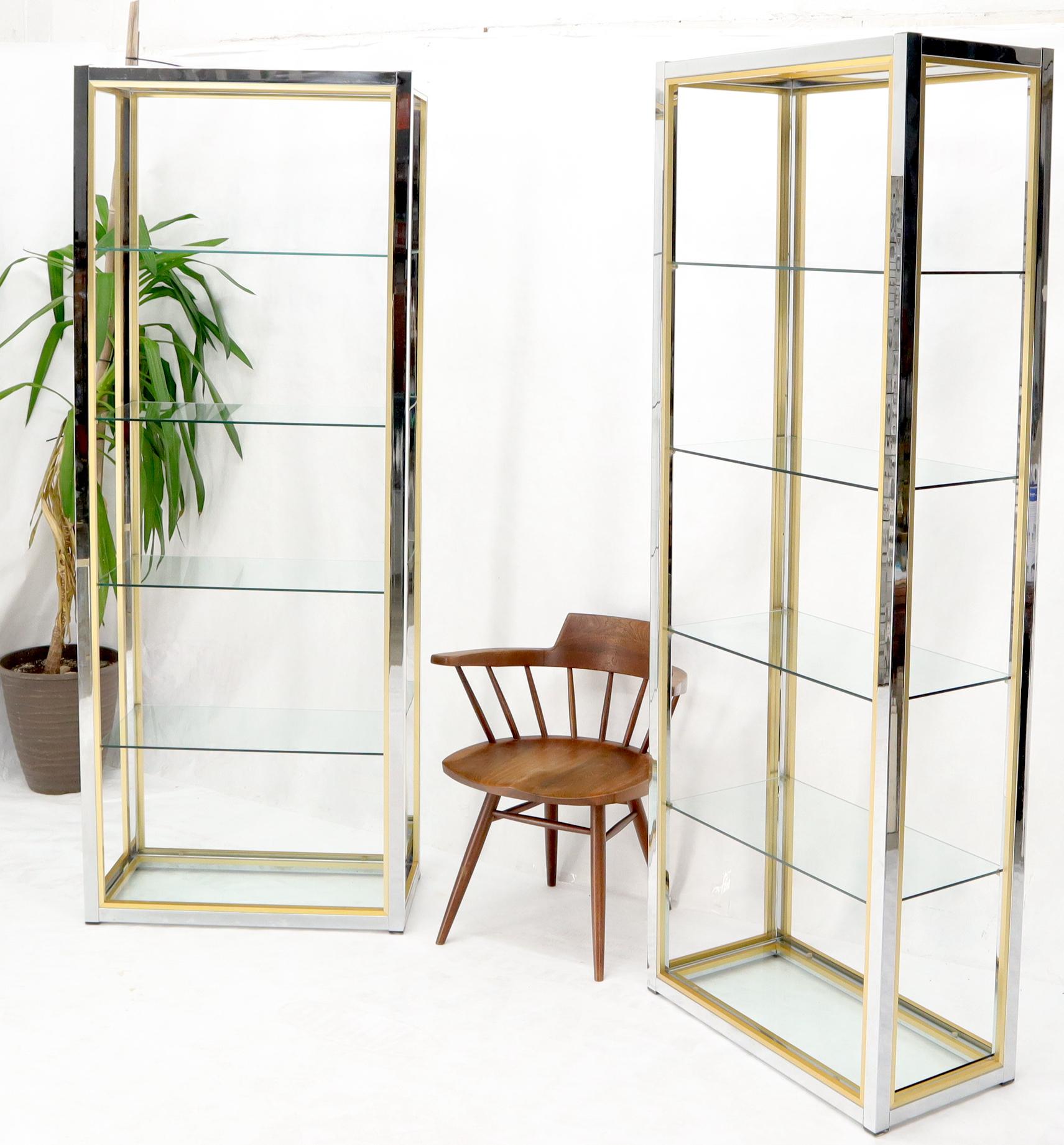Pair of very sharp looking high quality craftsmanship étagères with glass shelves in style of Romea Riga.