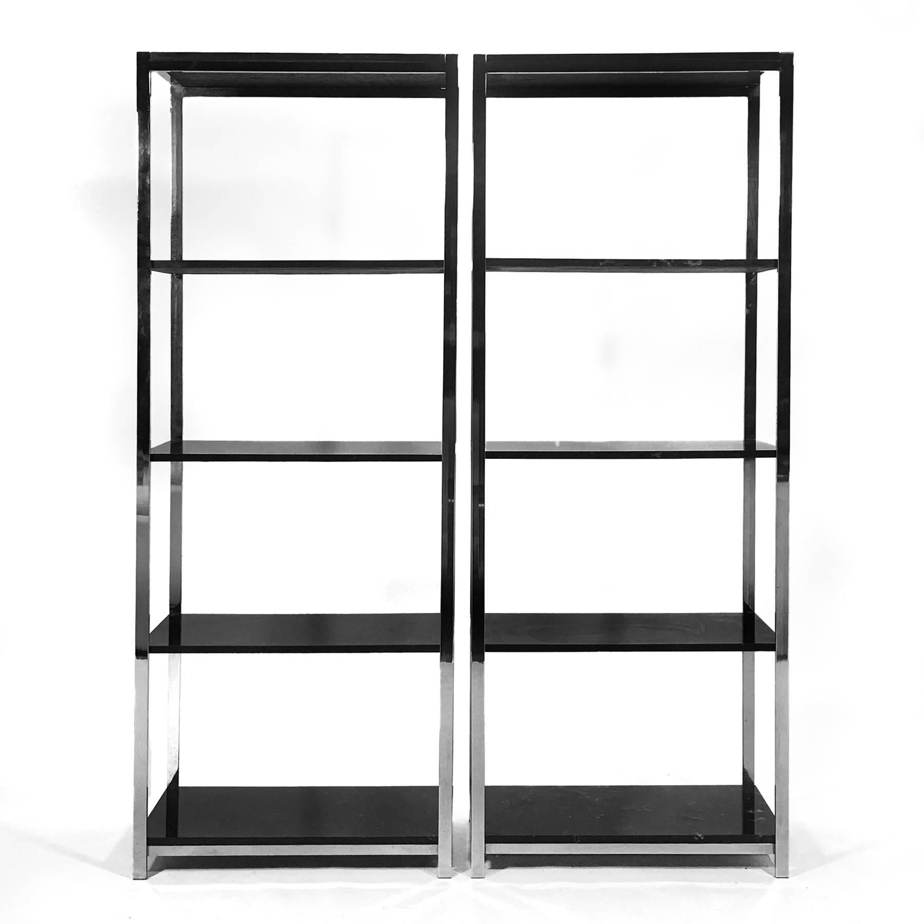 This handsome pair of étagères are very similar to Baughman's work for Directional and DIA. They feature chromed steel frames and marbleite shelves.