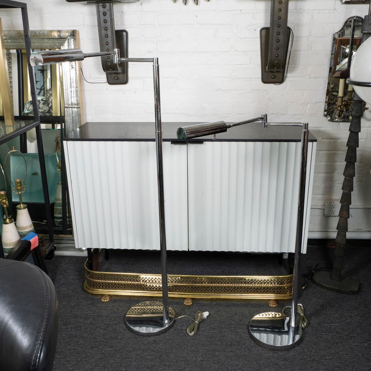 Chrome Pair of chrome Koch and Lowy articulated floor lamps For Sale