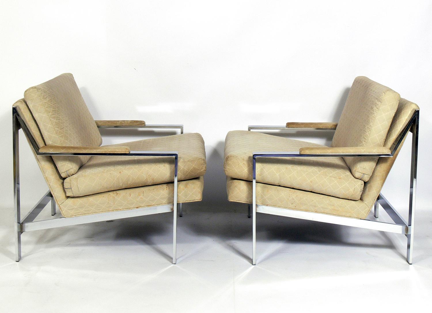 Pair of chrome lounge chairs by Cy Mann, American, circa 1960s. For years these chairs were attributed to Milo Baughman. These chairs are currently being reupholstered and can be completed in your fabric at no additional charge. The price noted