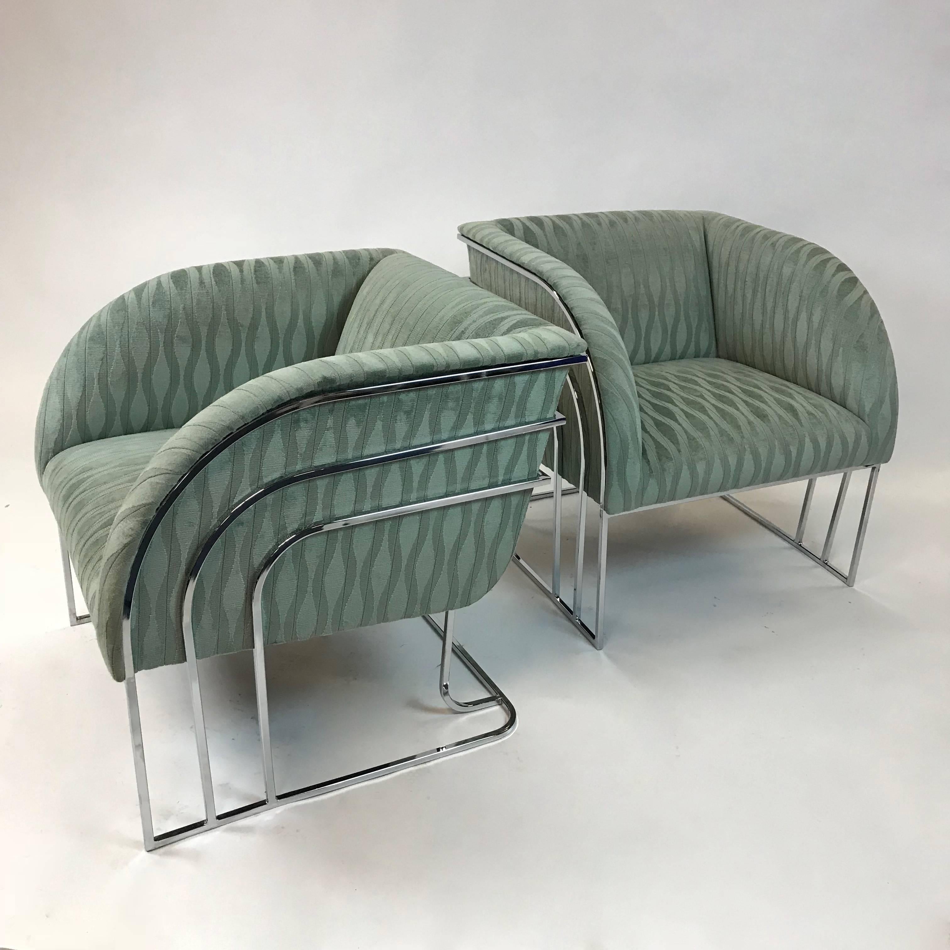 Stunning pair of club, lounge chairs by George Mergenov for Weiman/Warren Lloyd featuring rainbow, chrome frames are newly upholstered in moss green jacquard. These chairs are very much in the style of Milo Baughman and are sometimes attributed to