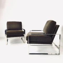 Pair of Chrome Lounge Chairs in the style of Milo Baughman