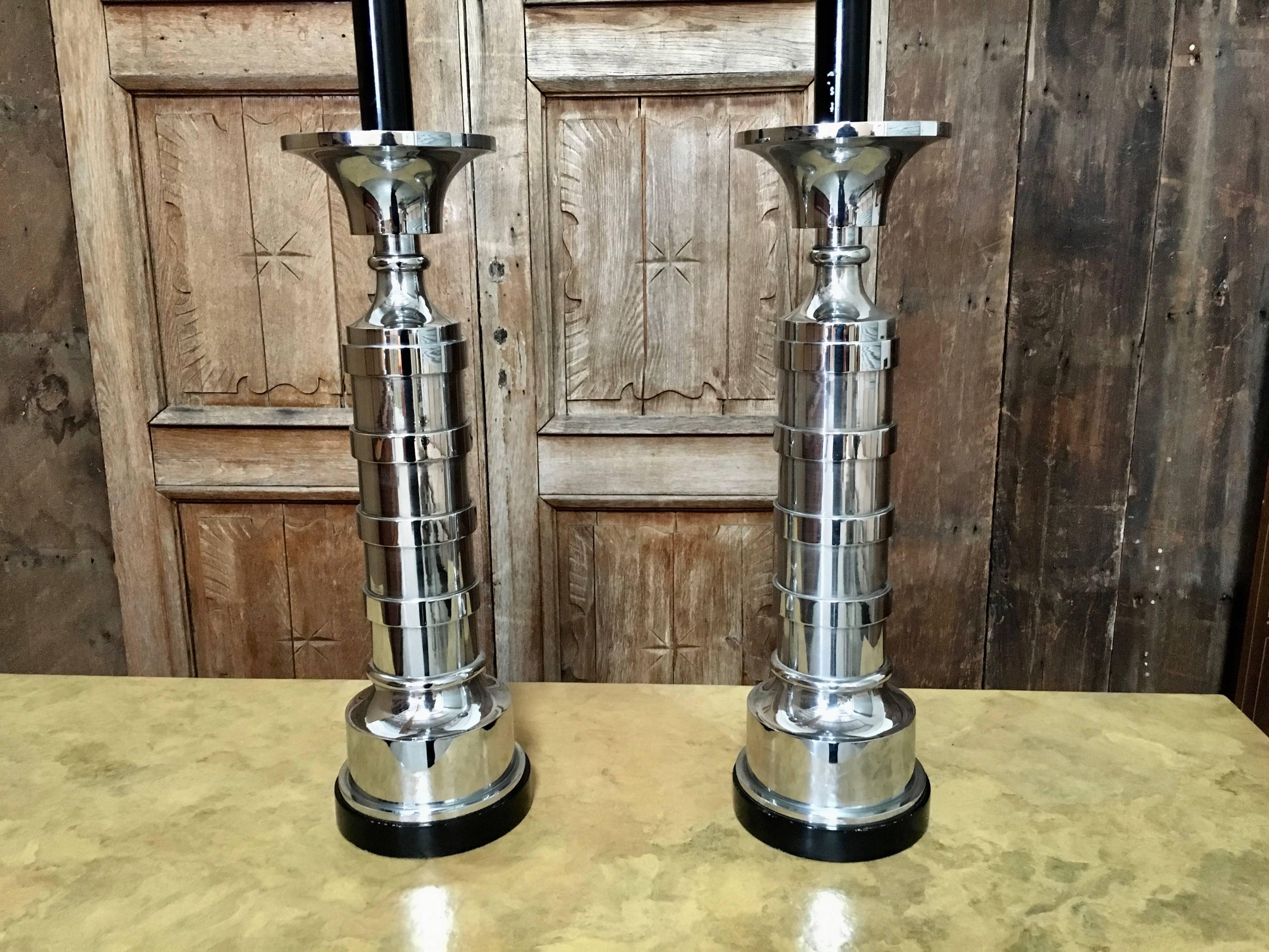 Large pair of Mid-Century Modernist chrome lamps on black wood base
the base is 7