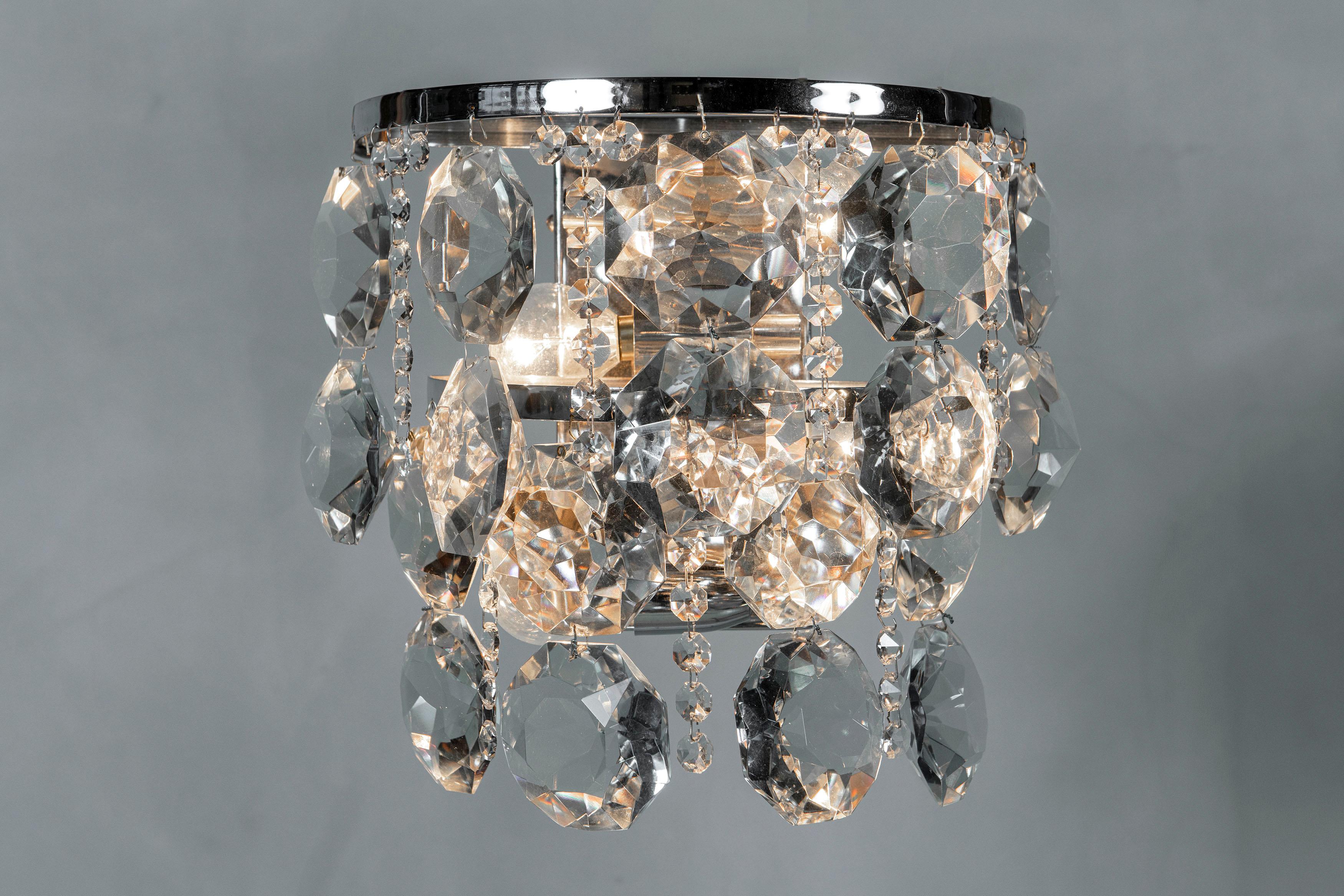 Pair of chrome metal and crystal glass sconces attributed to Bakalowits & Sohne, circa 1960.