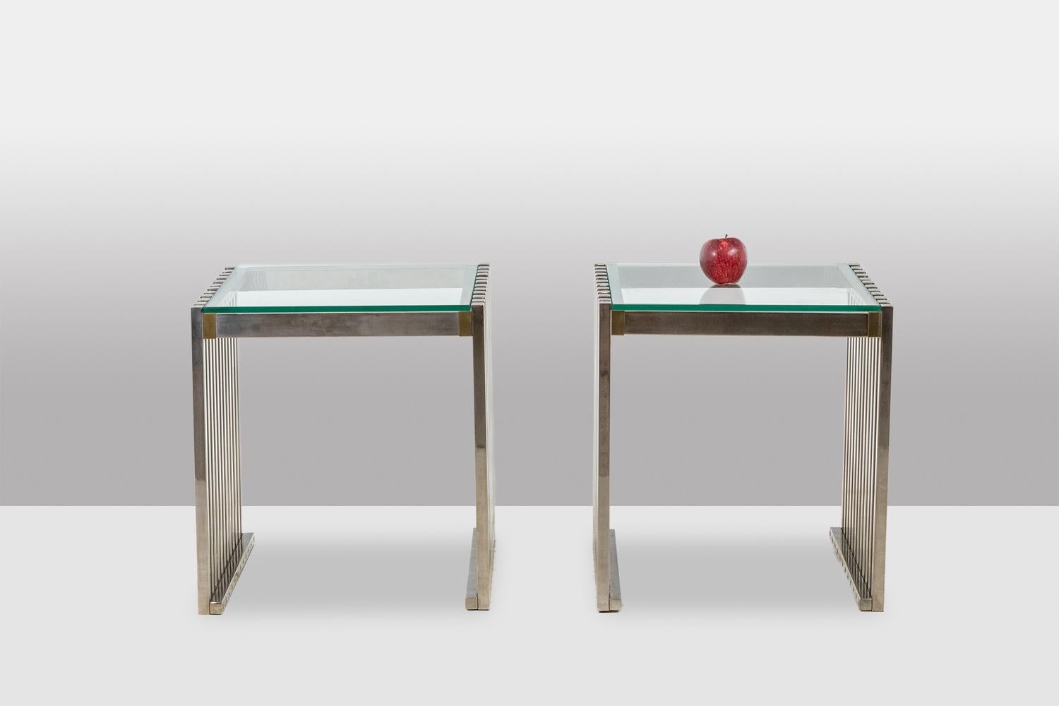 Pair of chrome and gold metal end tables or bedside tables with glass tops (glass thickness: 10 mm).
French work made in the 1970s.
Dimensions: H 50 x W 46.5 x D 46 cm
Reference: LS6509