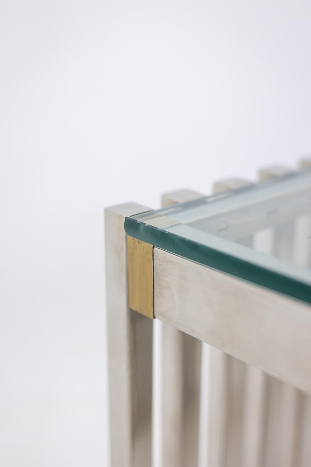 Chrome Pair of chrome-plated metal end tables or bedside tables. 1970s. For Sale