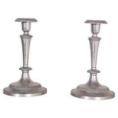 Paire de chandeliers en zinc chromé