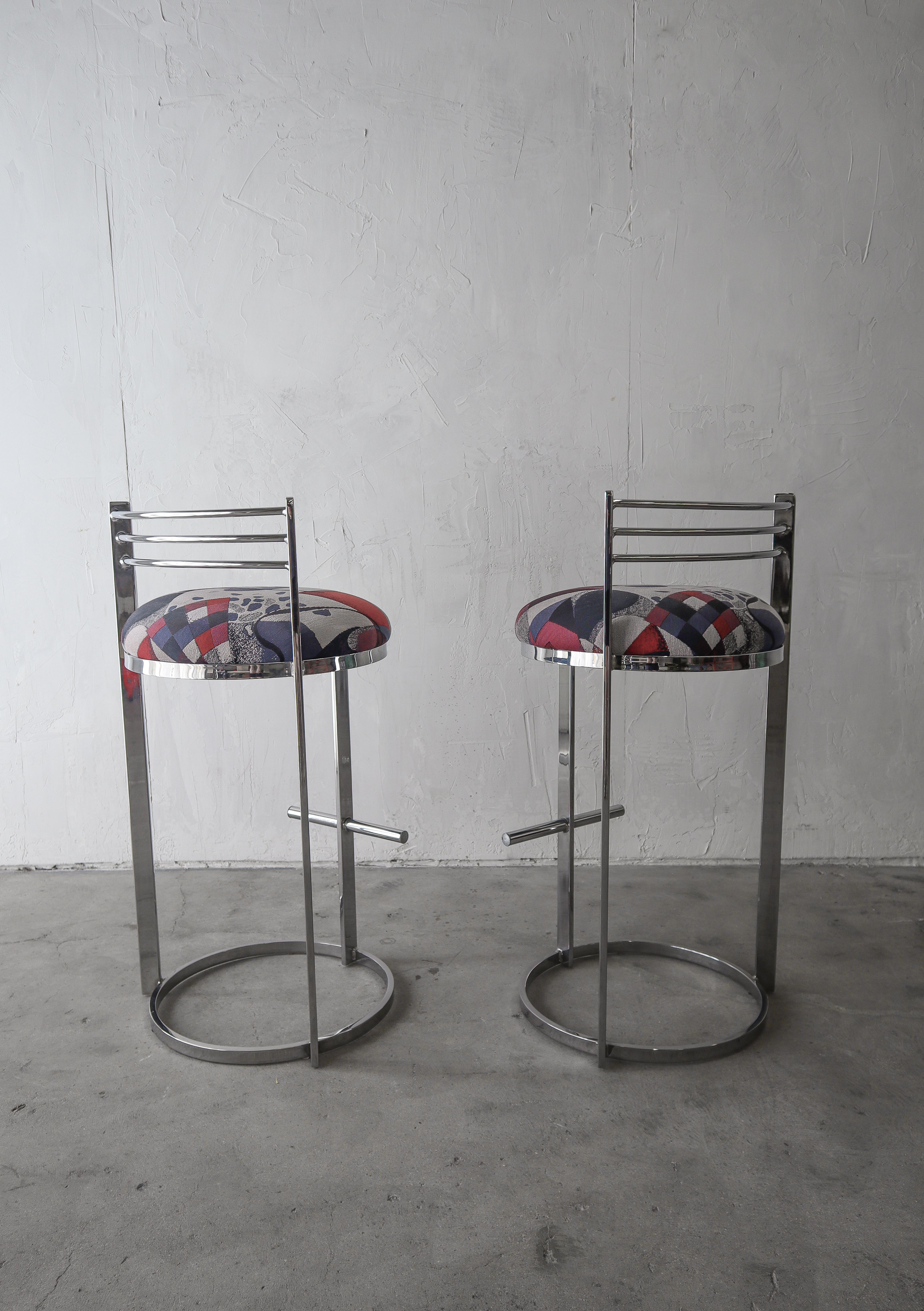 Fun pair of chrome Post Modern stools.

Stools are in excellent, as found condition. Chrome shows minimal signs of age appropriate wear but is shiney with no real damage. Fabric is free of stains, odors or damage. Stools can be used as is.

