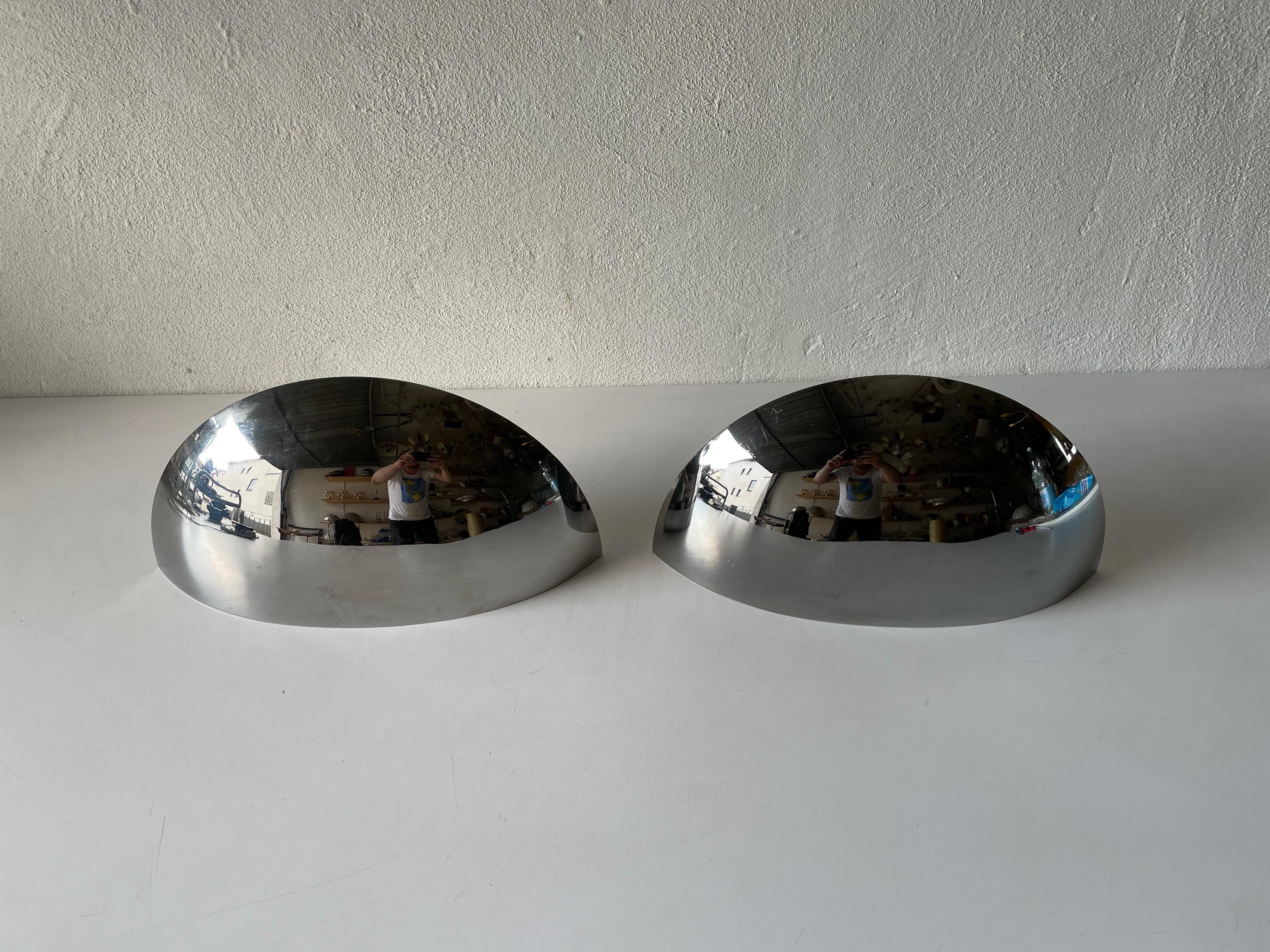 Pair of chrome sconces by Art-Line, 1980s, Germany

Very elegant and Minimalist wall lamps

Lamps are in very good condition.

These lamps works with 2xE14 standard light bulbs. Each lamp works with 1 light bulb. Max 40 W
Wired and suitable