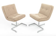 Pair of Chrome Steel and Cream Bouclé Lounge Chairs by Raphael Raffel, France