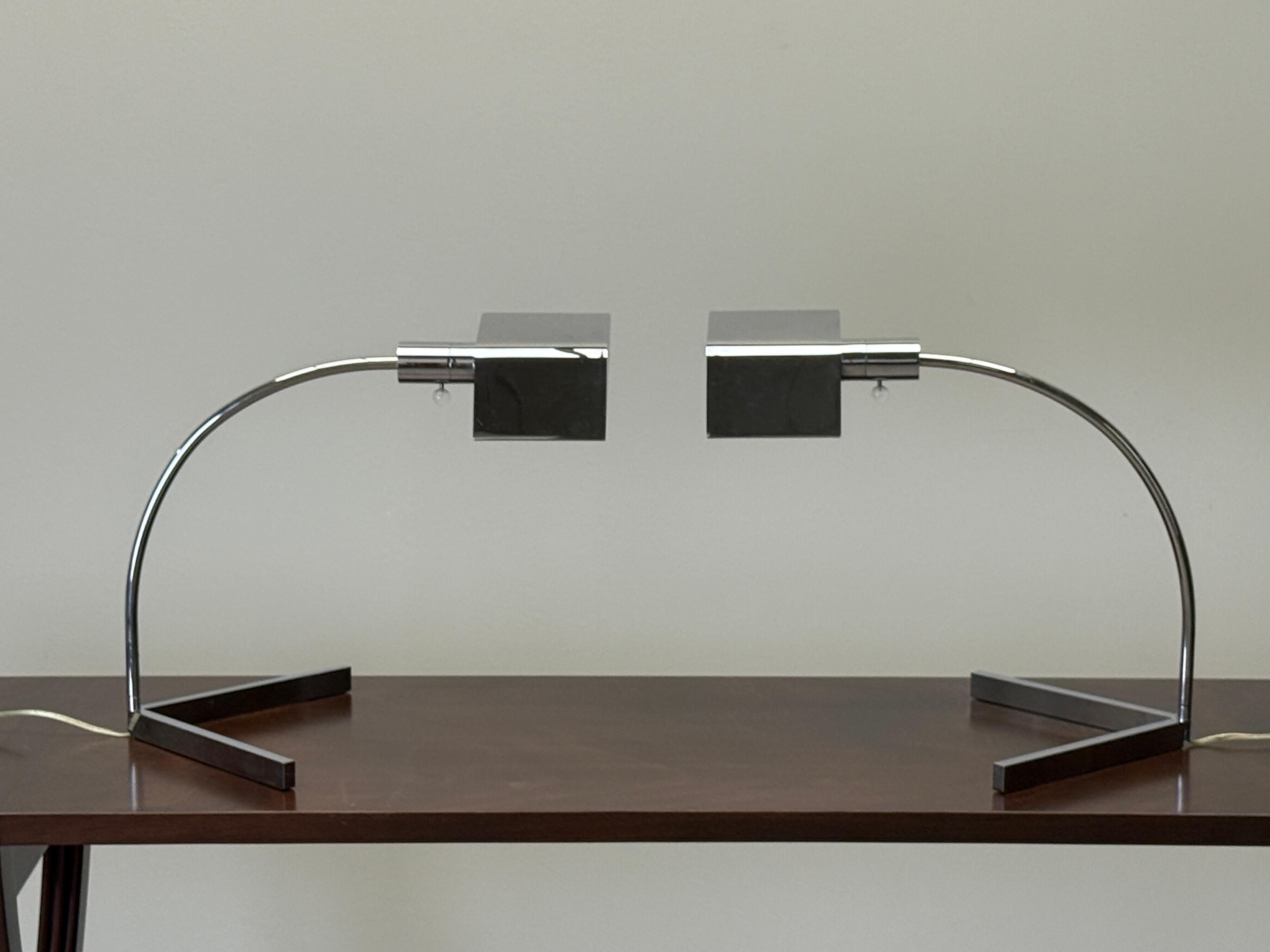 A matching pair of chrome Cedric Hartman table lamps. 