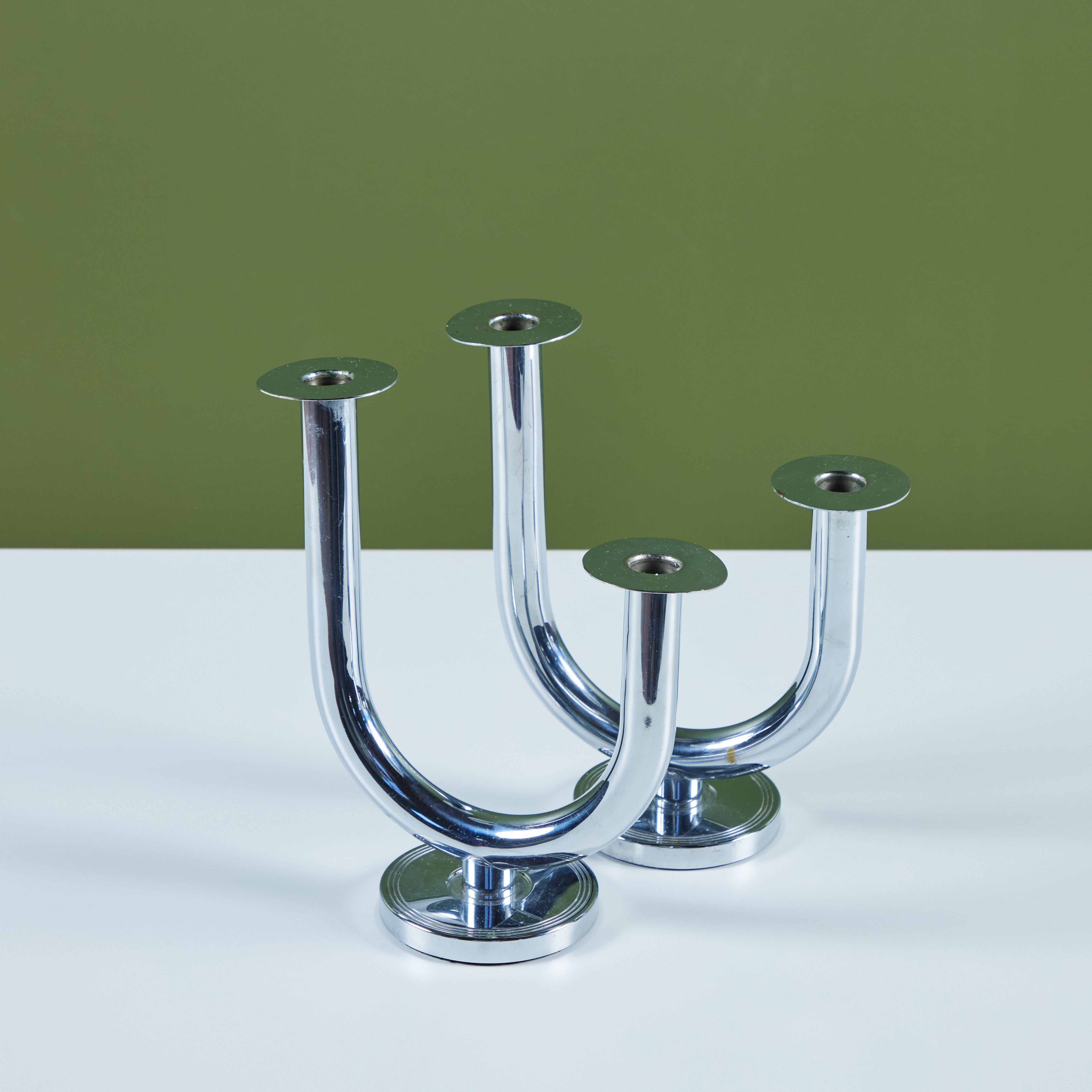 Pair of chrome candle holders by Walter Von Nessen for Chase Brass and Copper Company of Connecticut, c.1930s, USA. The pair of Art Deco candle sticks feature a 