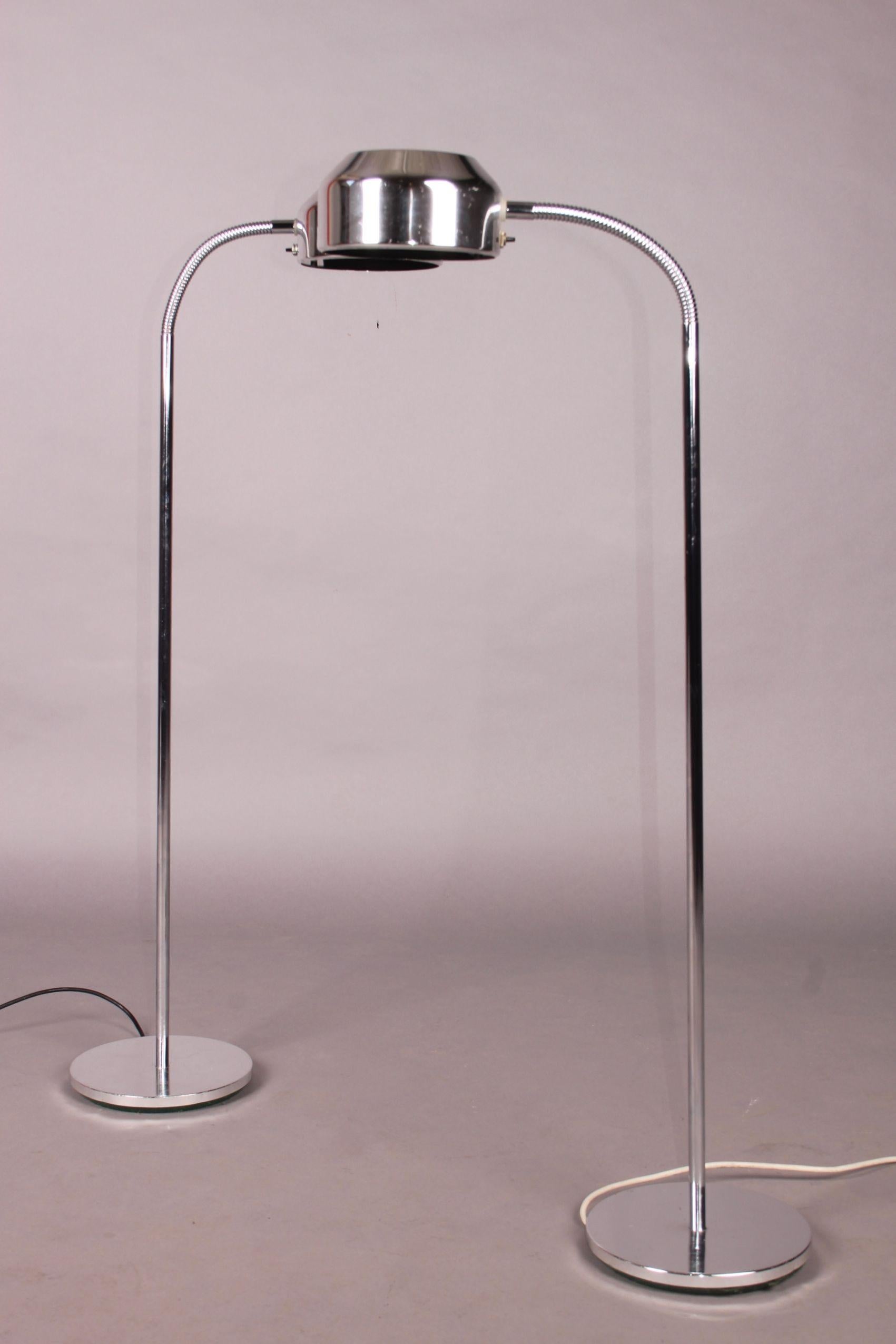 Pair of chromed floor lamp, small scratches on the base.