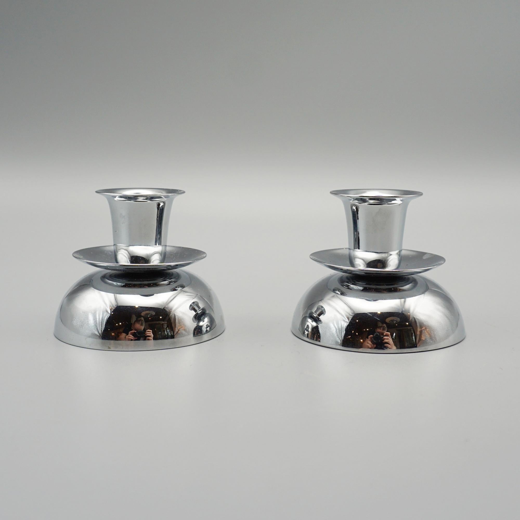 Pair of Art Deco style candlesticks. Chromed metal.