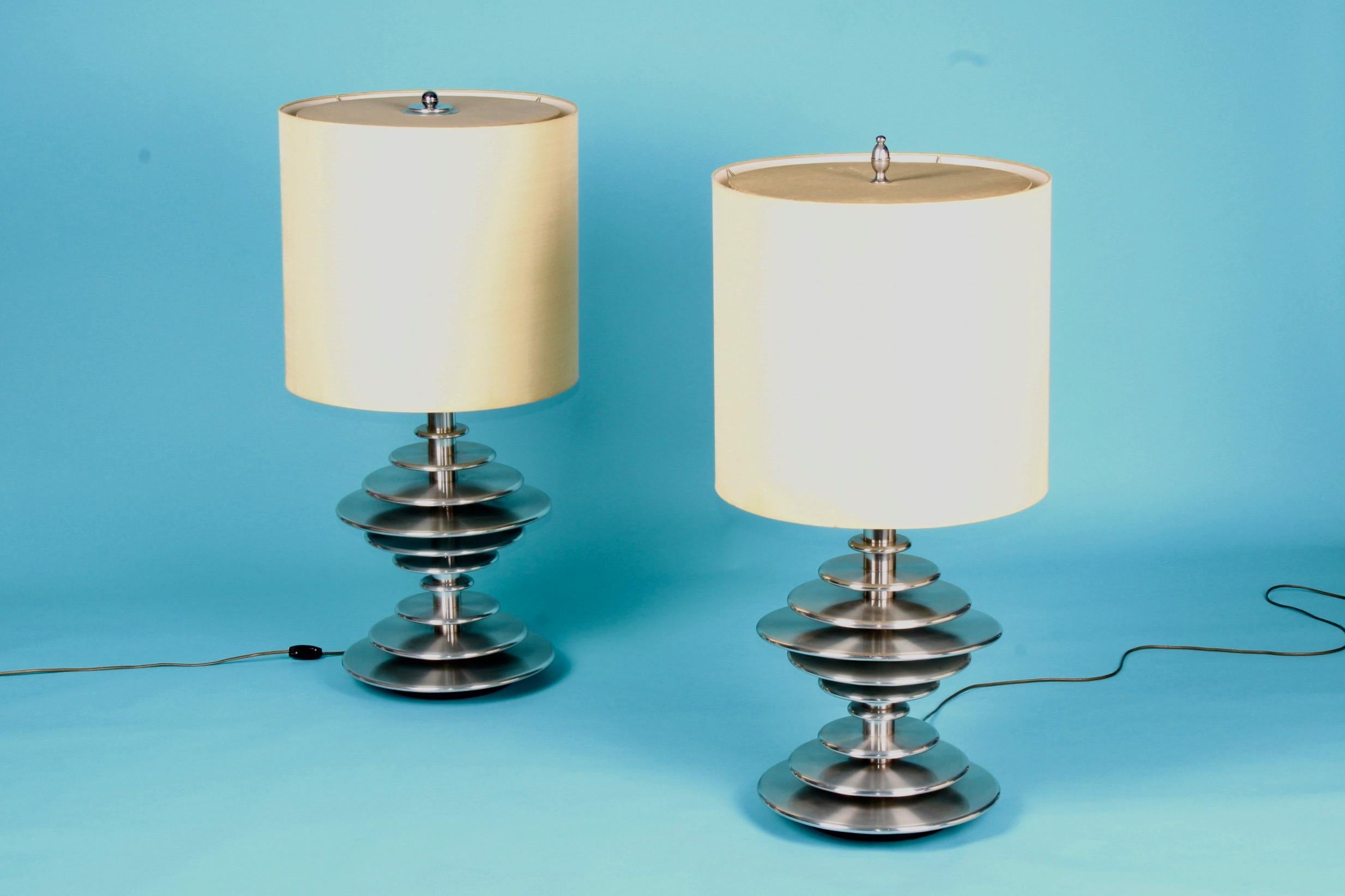 Pair of chromed metal table lamp, the shade is damaged see photo, dimensions with out shade height 91 cm, diameter 34 cm.