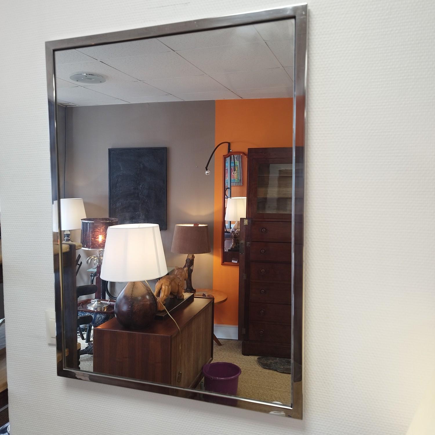 Pair of chromed mirrors on steel frames. The chrome is in very good quality. 

Do not hesitate to contact me for a shipping quote.
