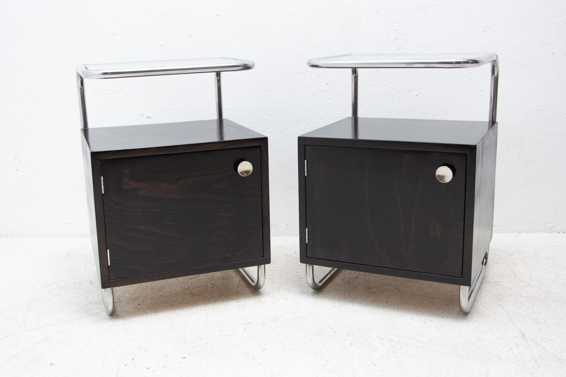 A pair of minimalist night stands in the Bauhaus style. Outstanding timeless design. Made in the former Czechoslovakia in the 1950´s. It was produced by Kovona company. A typical example of the Bauhaus period in Central Europe. Chrome is in very