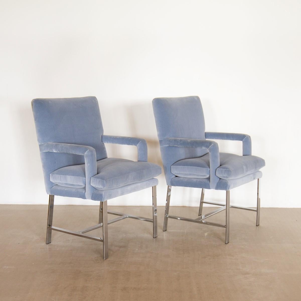 Pair of chromium steel framed velvet upholstered carver armchairs late 1970s reupholstered by Talisman here in our UK workshops
Generously proportioned armchairs that could be perfect as guest chairs for a large desk or tidy sized armchairs in a