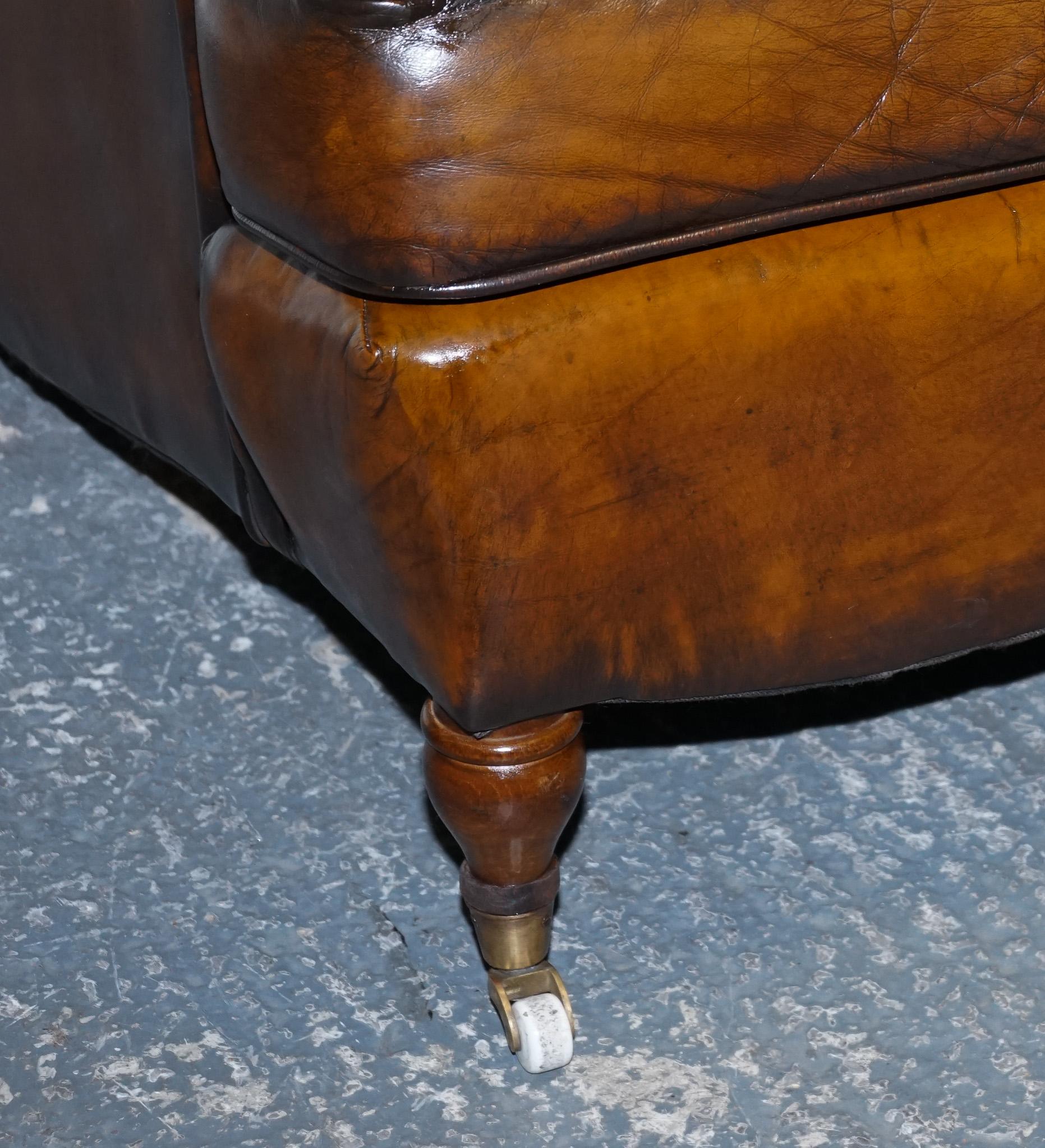 Leather PAIR OF CIGAR HAND DYED LEATHER HOWARD & SONS STYLE ARMCHAiRS ON CASTOR FEET For Sale
