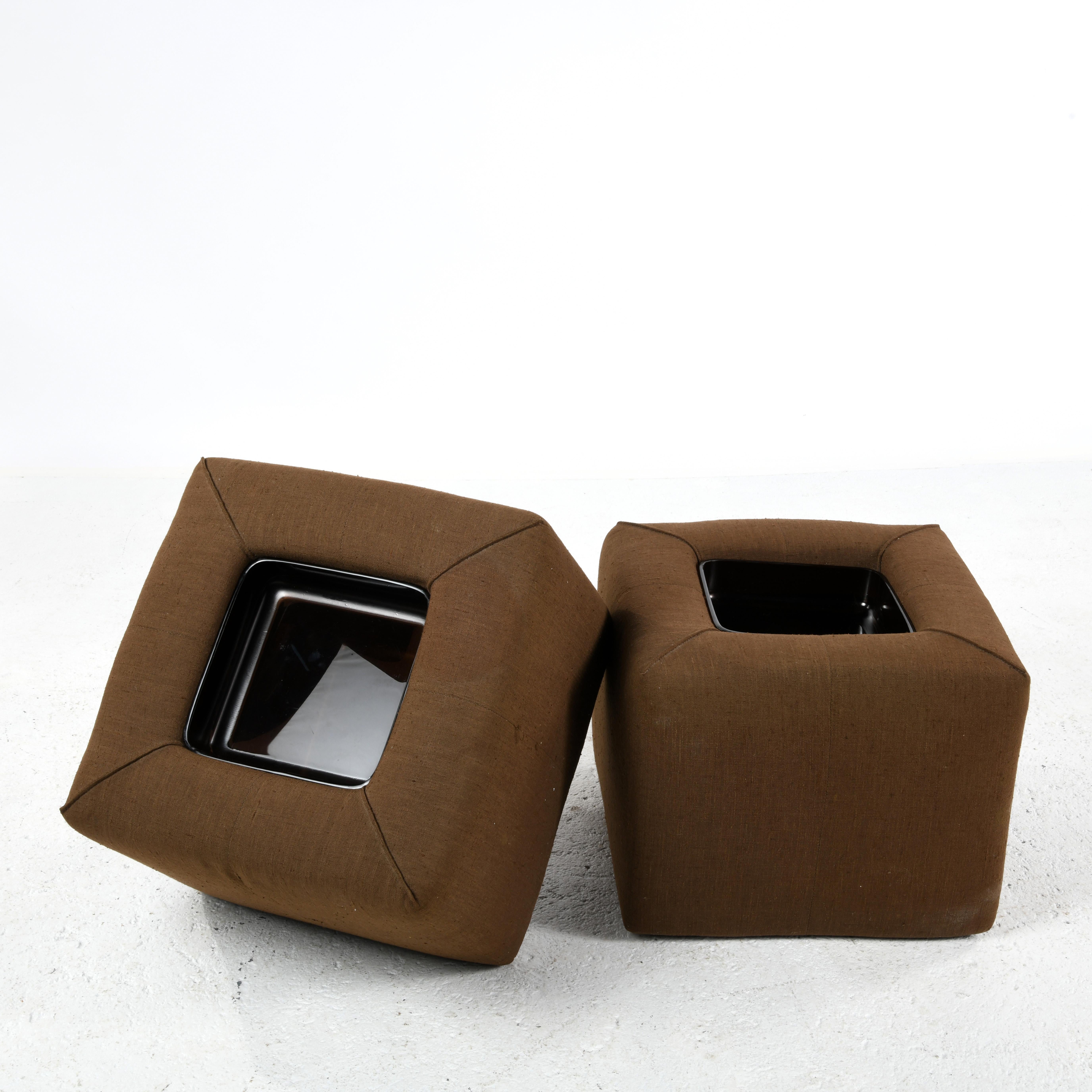 Pair of sofa ends from the 1970s, produced by Cinna in France. Foam cubes covered in brown linen fabric with removable covers. Inside is a smoked Plexiglas storage cube with a lid that can be positioned in two ways, forming a convex or concave