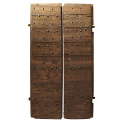 Antique Pair of circa 1700 Italian Larch Wood Doors with Nailheads